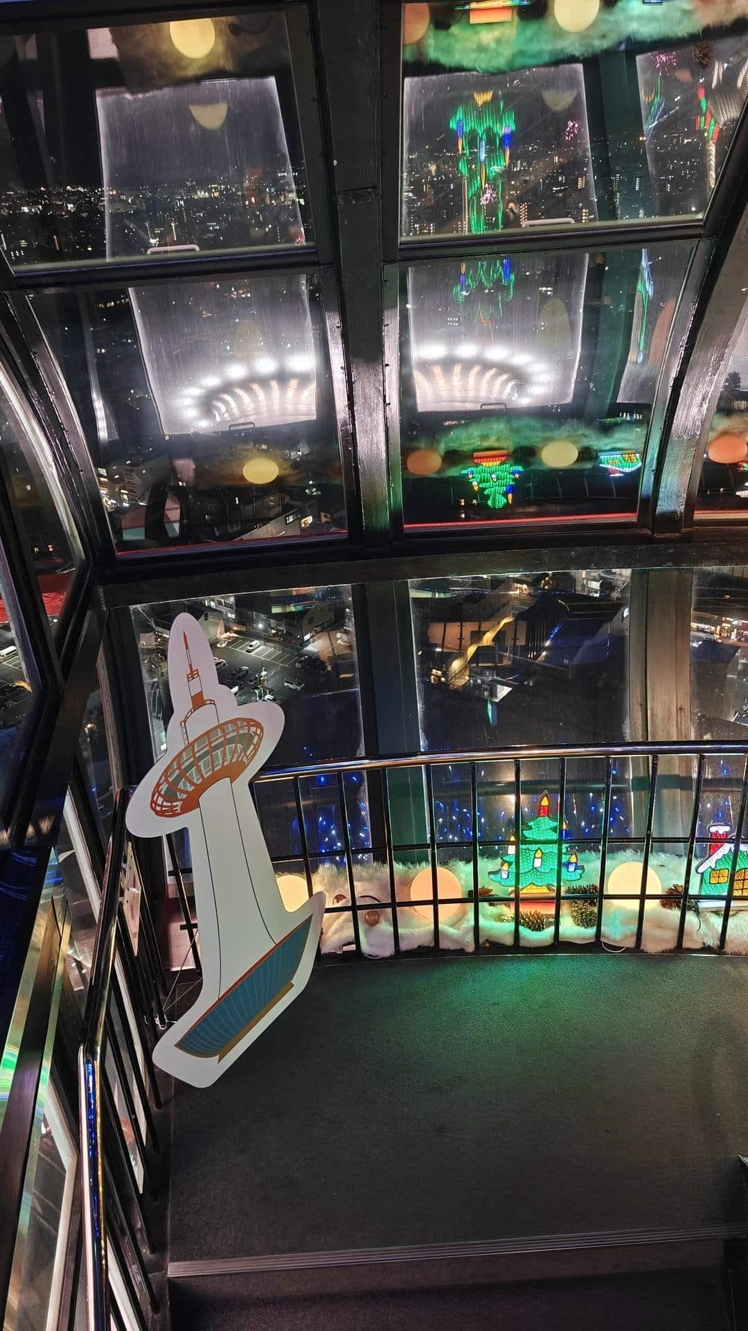City view from tower with neon lights