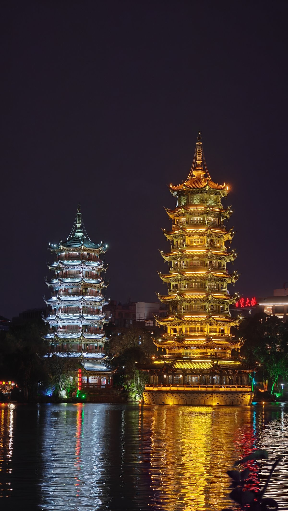 Close twin gold silver pagodas