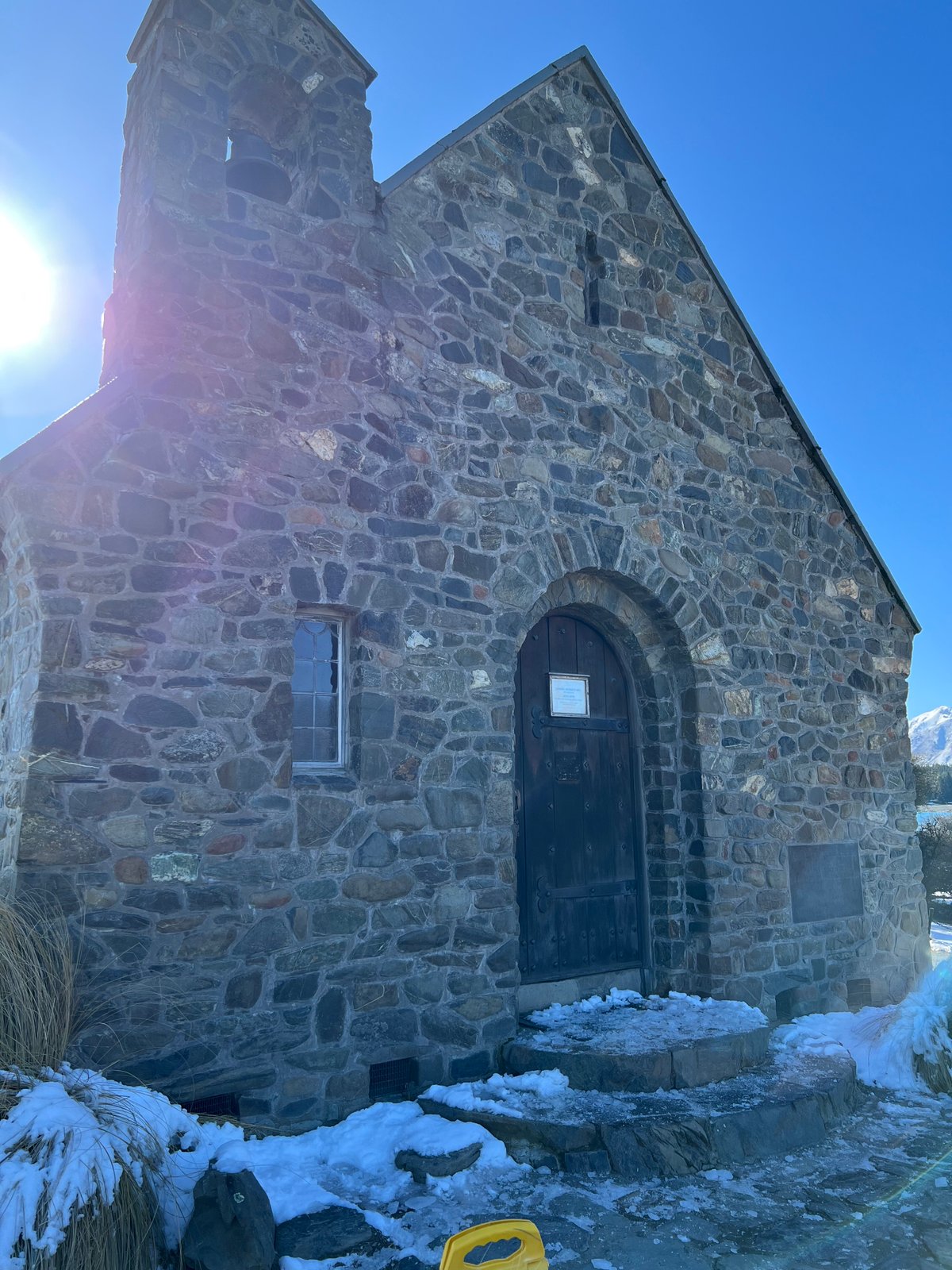Close view of the arched entrance doorway in