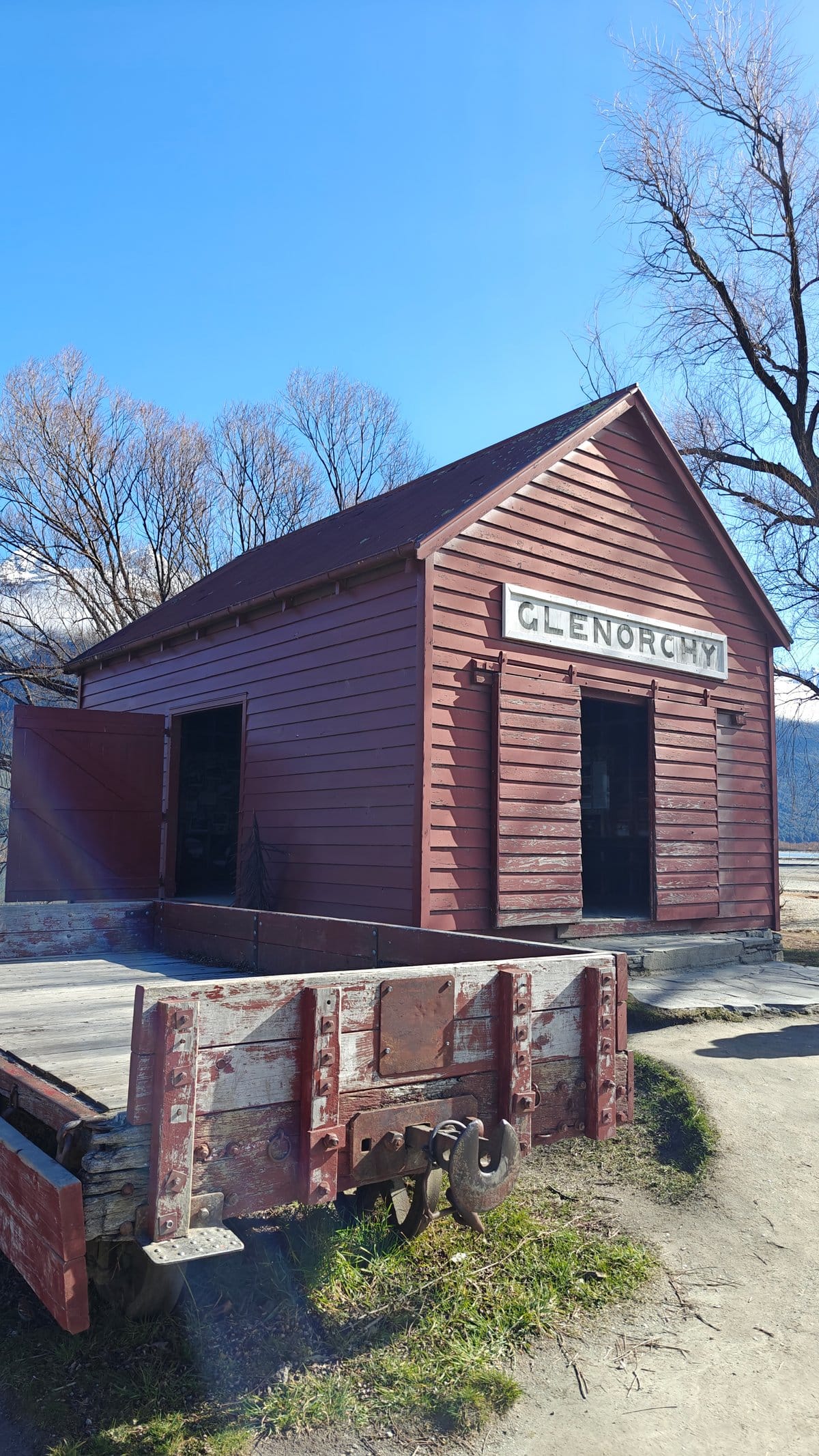 Close view of the red 'GLENORCHY' wharf shed