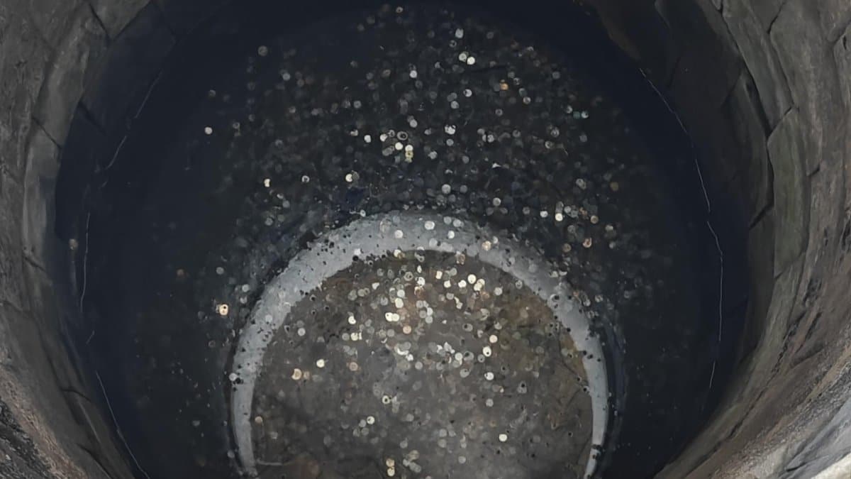 Coins at the bottom of a wishing well