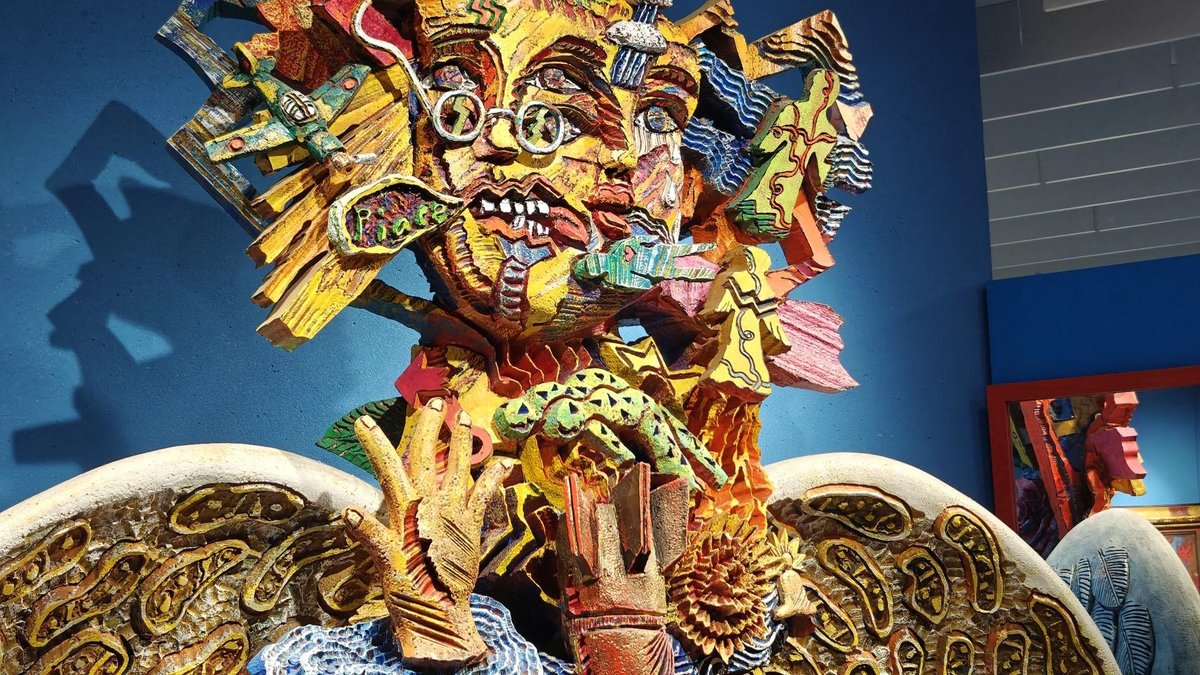 Colorful abstract sculpture with faces