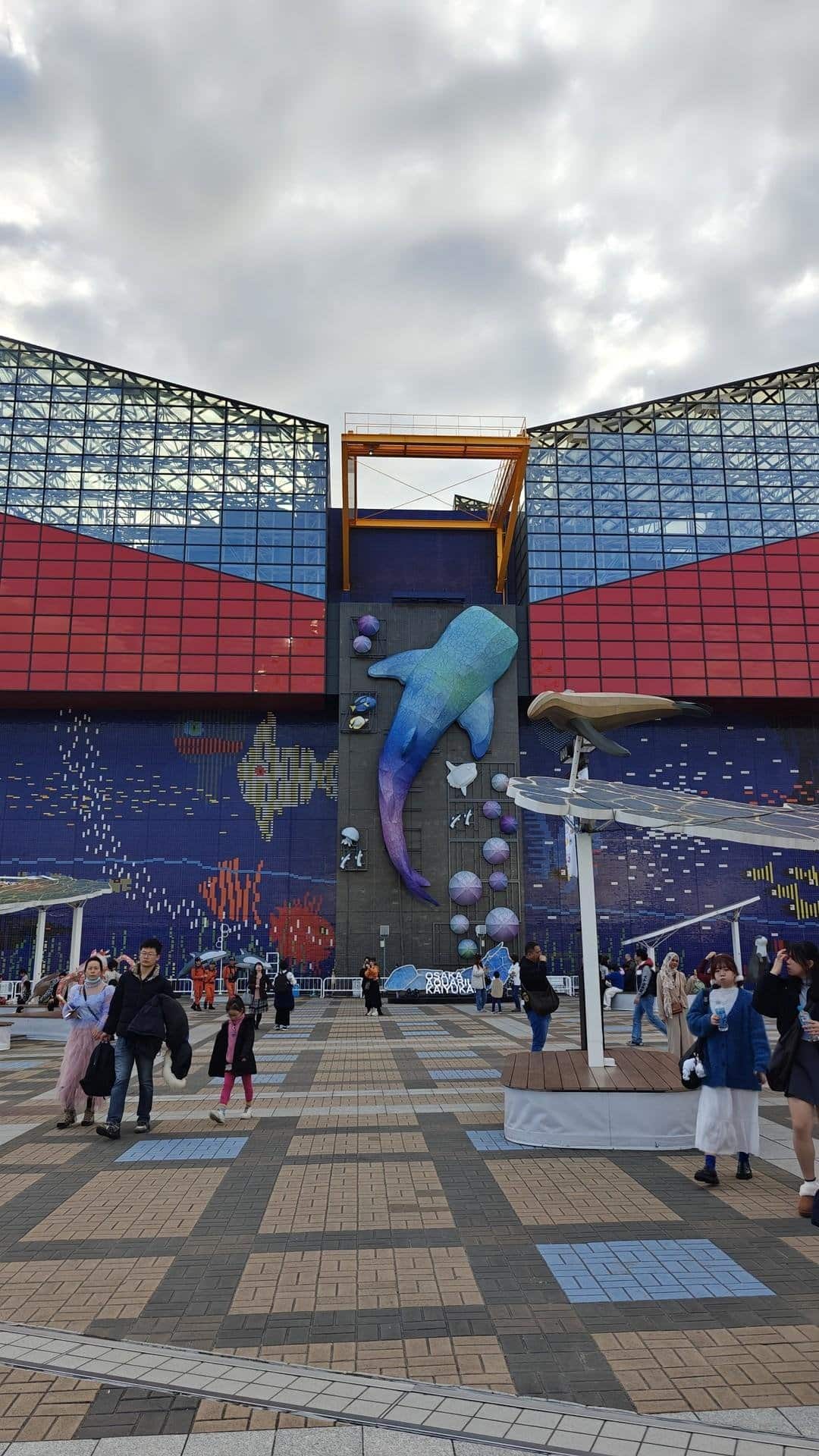 Colorful aquarium with whale mural