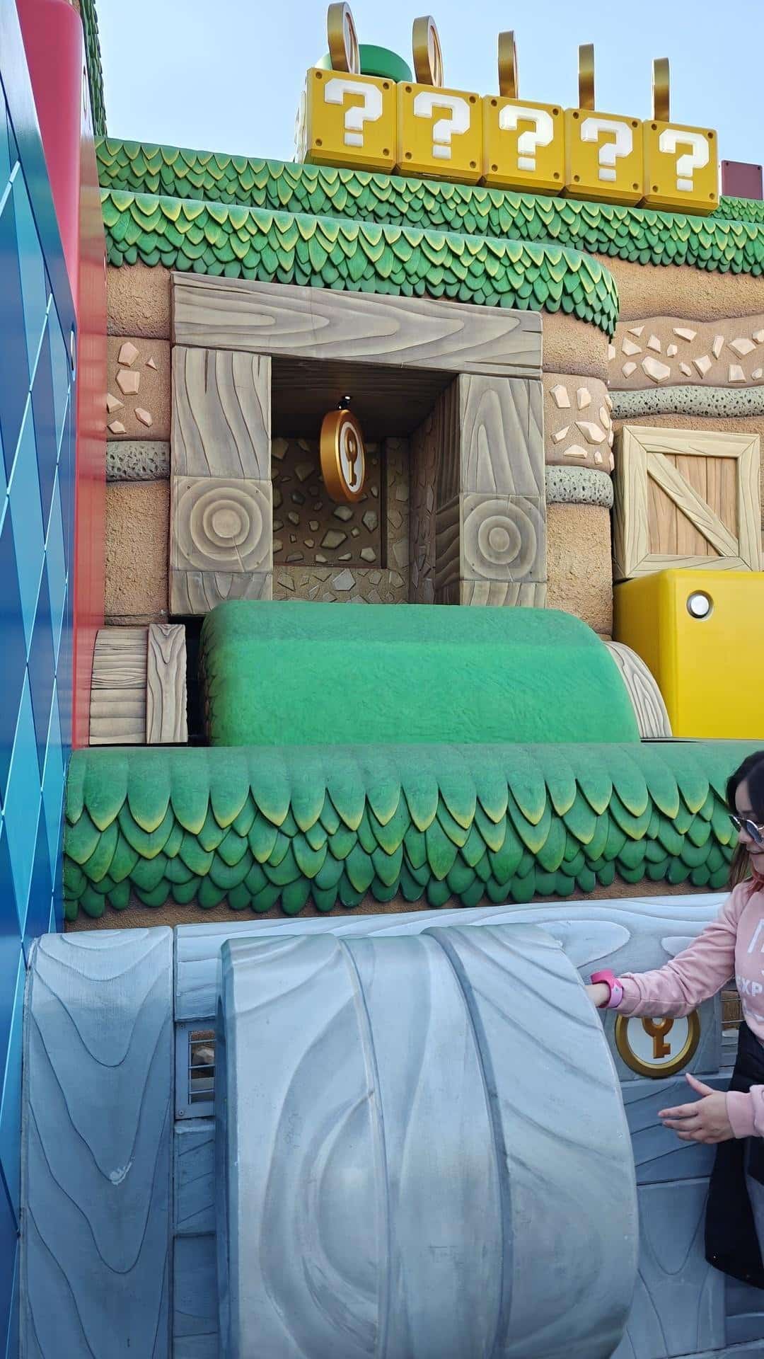 Colorful game-themed wall with coins