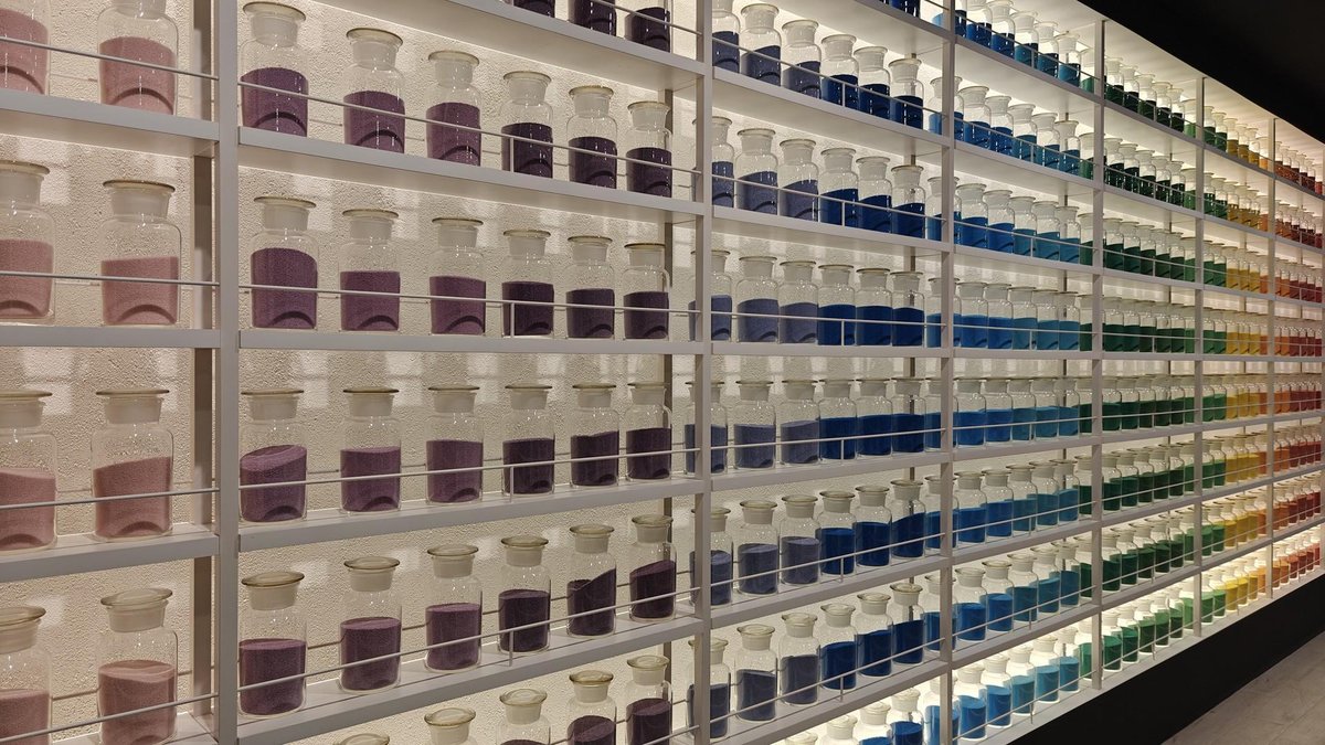 Colorful jars arranged on shelves
