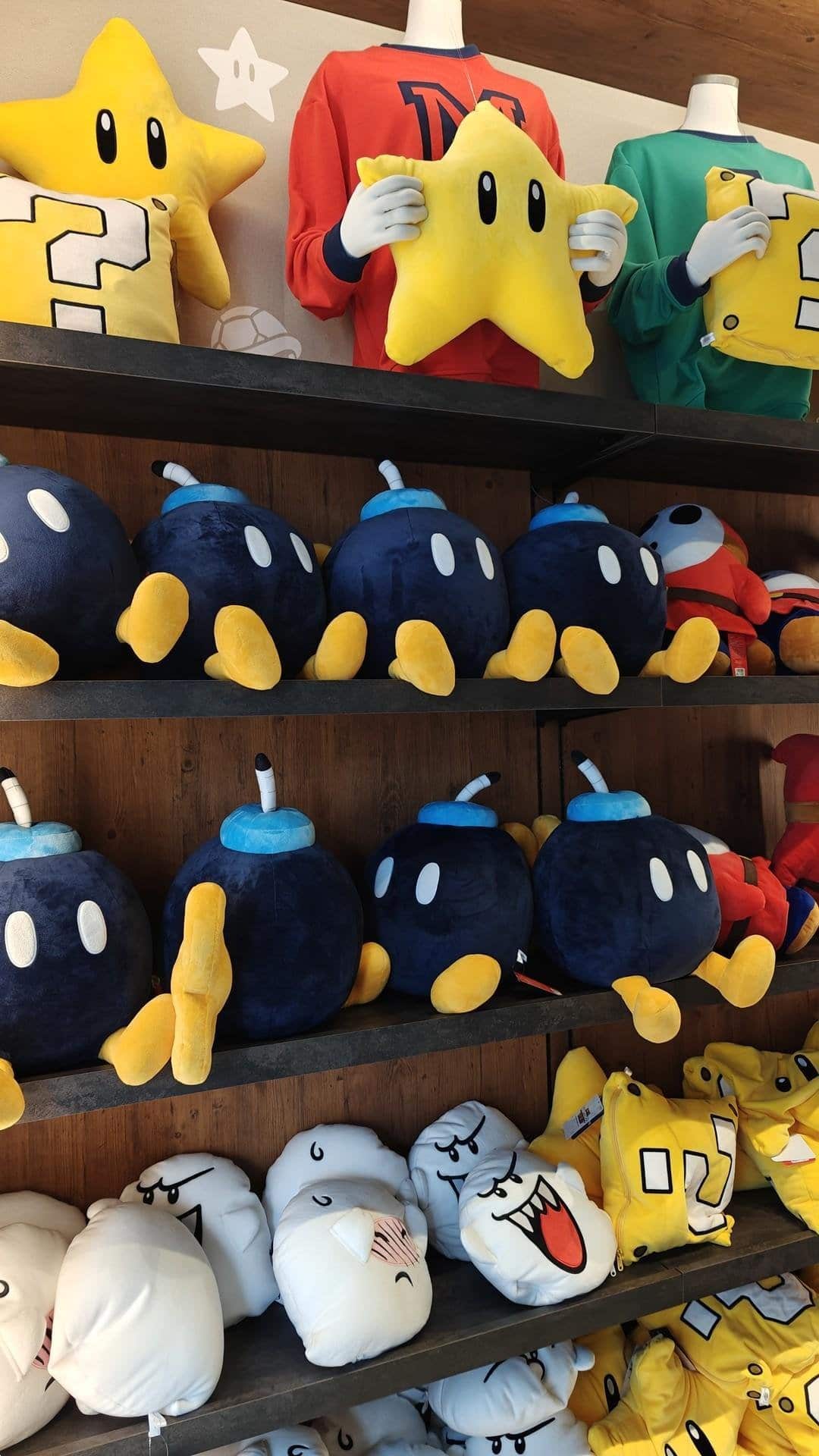 Colorful plush toys on shelves