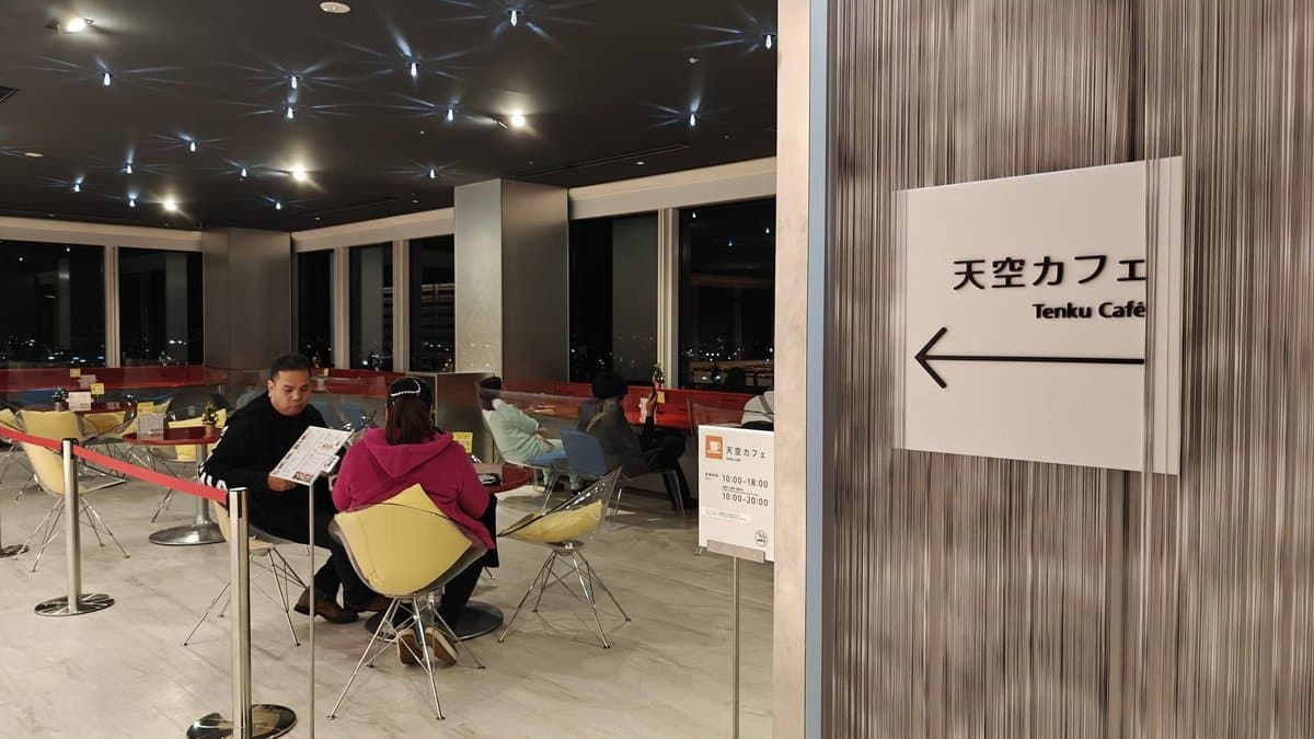 Cozy cafe with nighttime city view