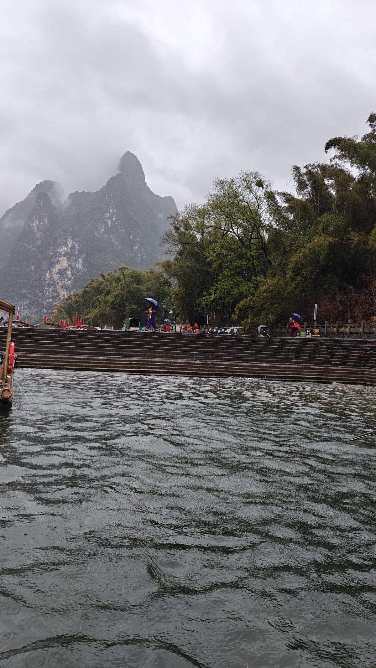 Departing dock into misty peaks