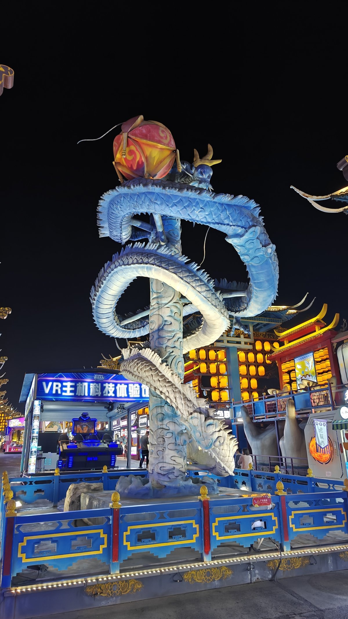 Dragon coiled on glowing column