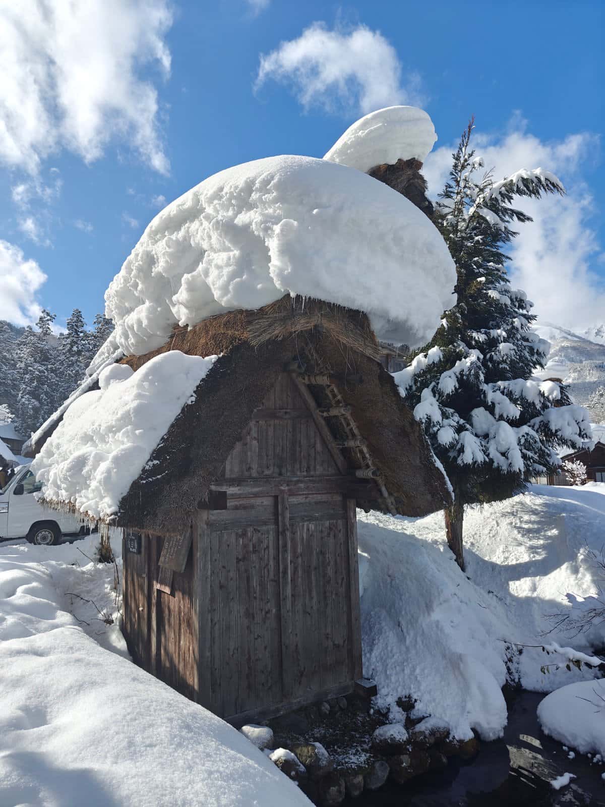 Dramatic curling snow roof overhang