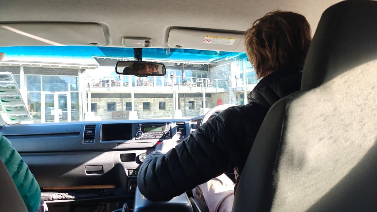 Establishing shot from inside the transfer shuttle: view
