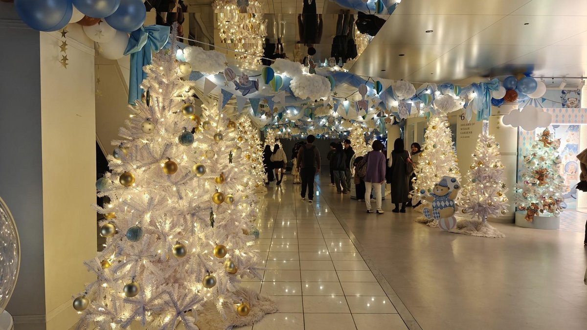 Festive indoor display with Christmas trees