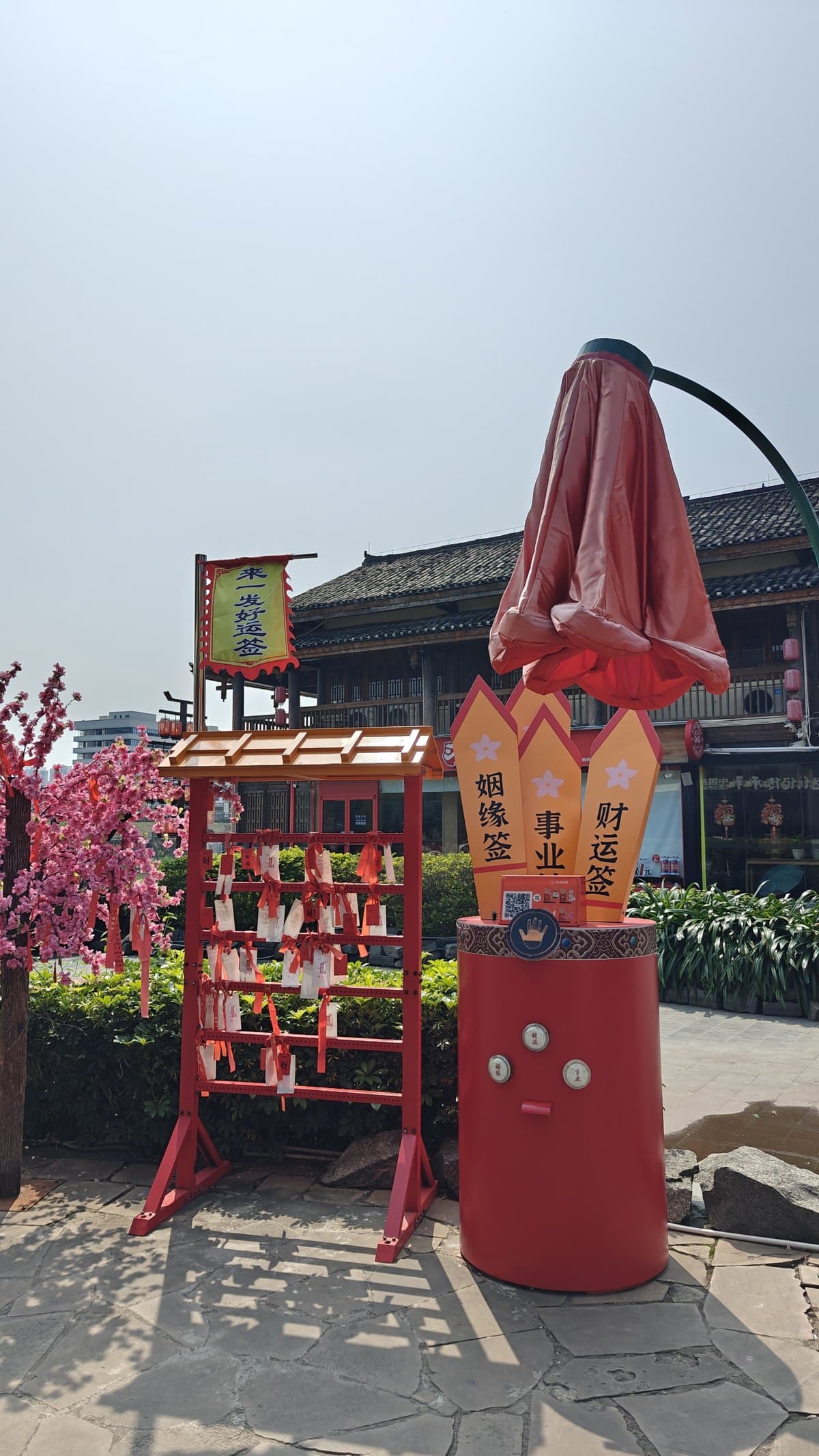 Fortune-telling stand with Chinese text tags, red machine,