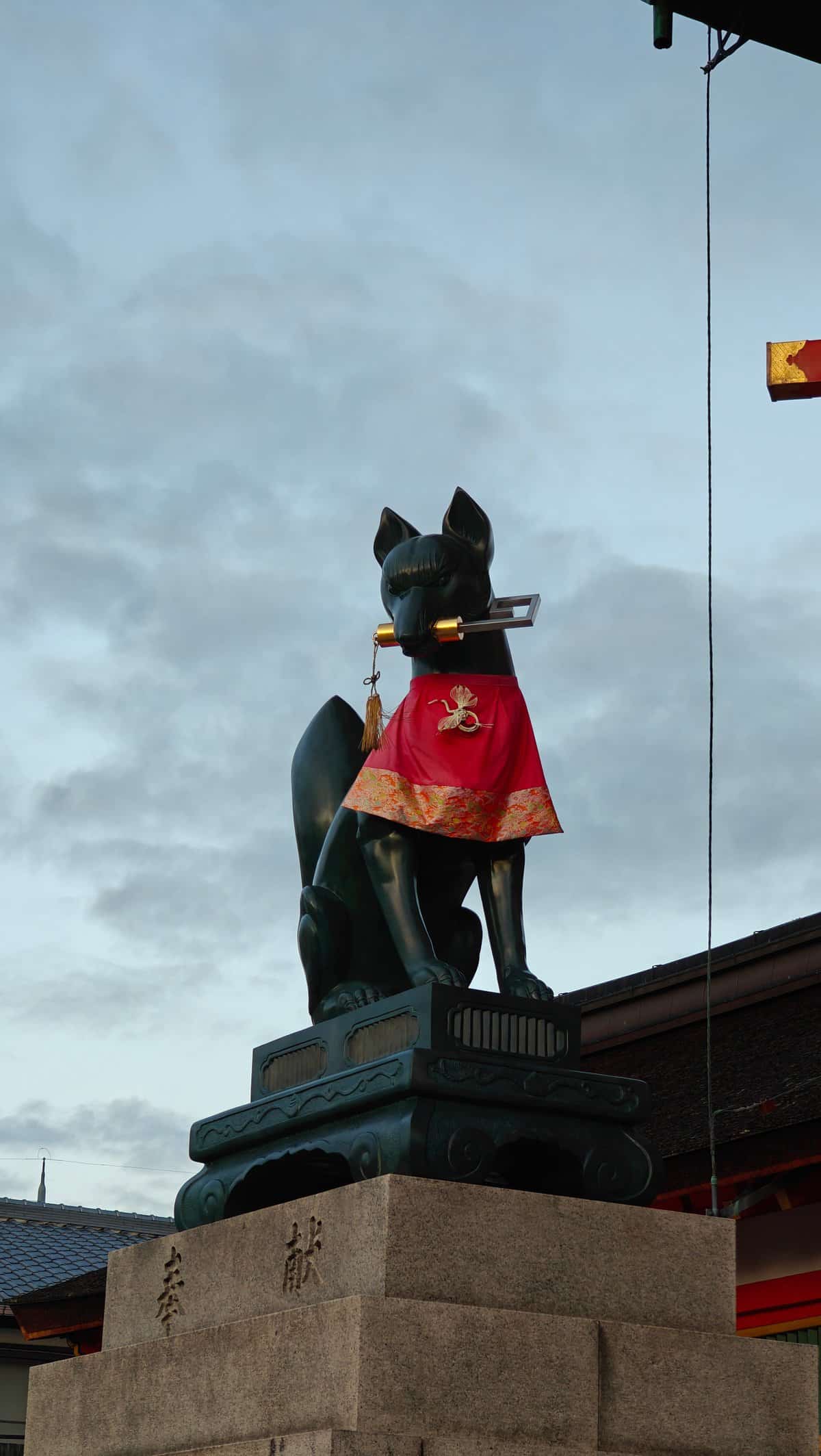 Fox statue evening sky silhouette