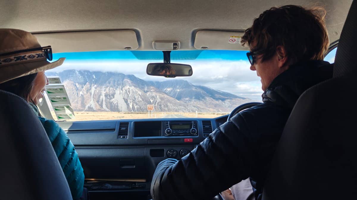 From the shuttle, snow-streaked mountains fill the windscreen