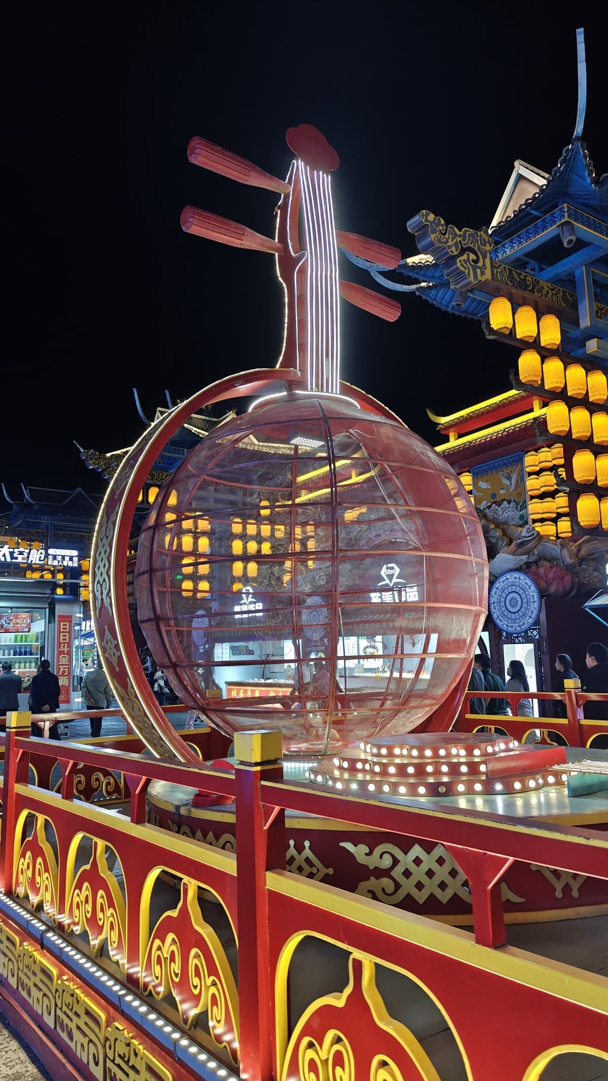 Giant illuminated pipa (Chinese lute) sculpture with lights