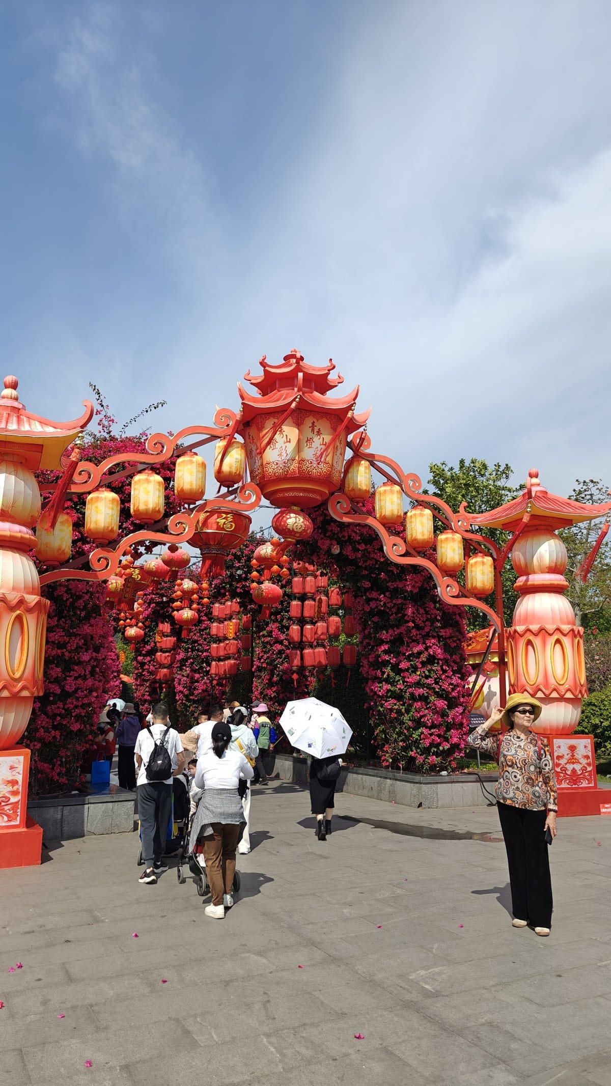 Giant lantern arch with bougainvillea