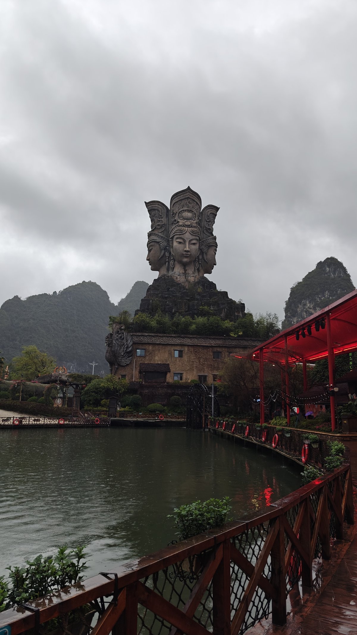 Goddess statue across lake view