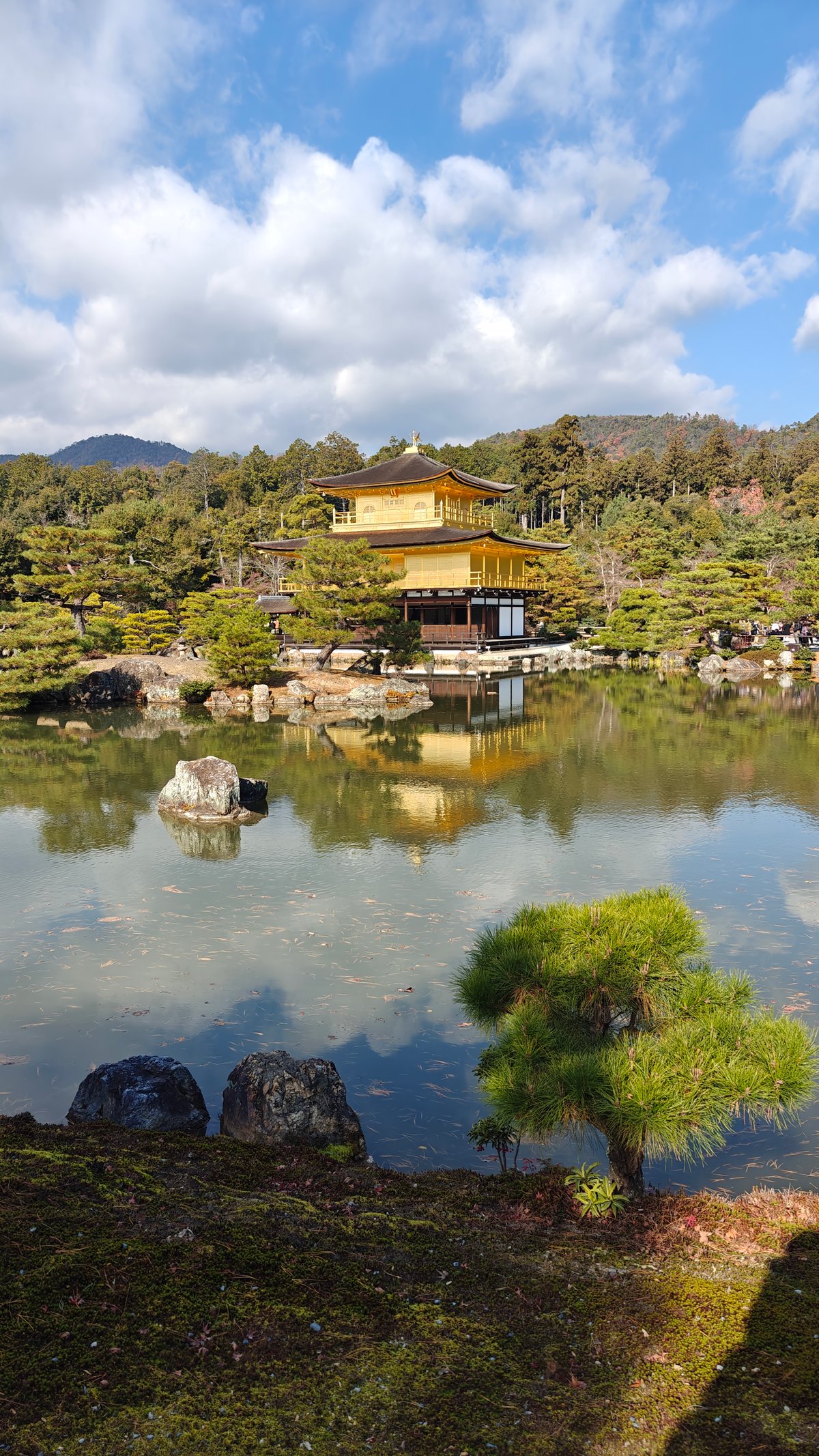 Golden Pavilion mirrored on still pond