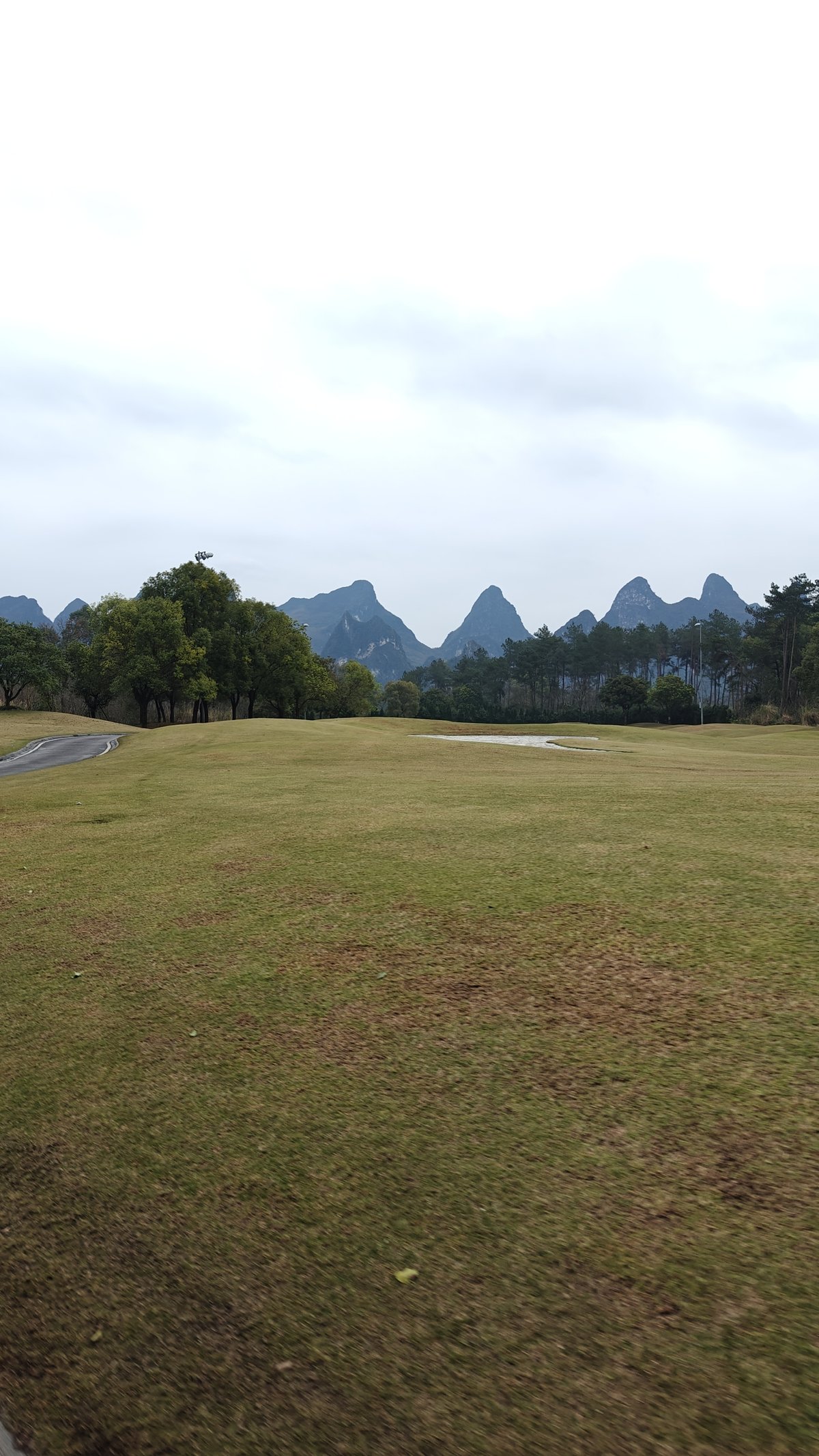 Golf fairways with karst peaks