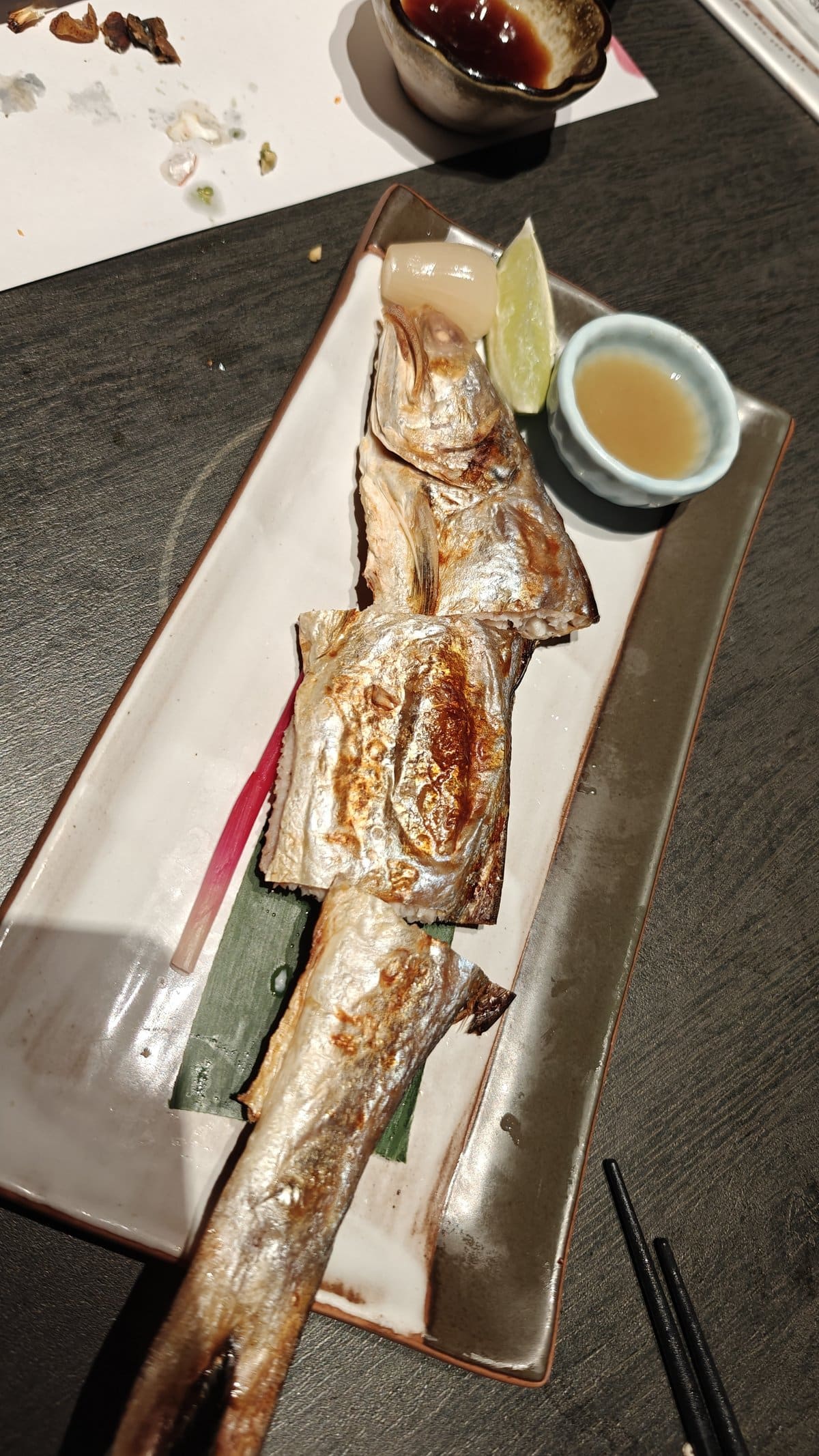 Grilled whole fish with sauce