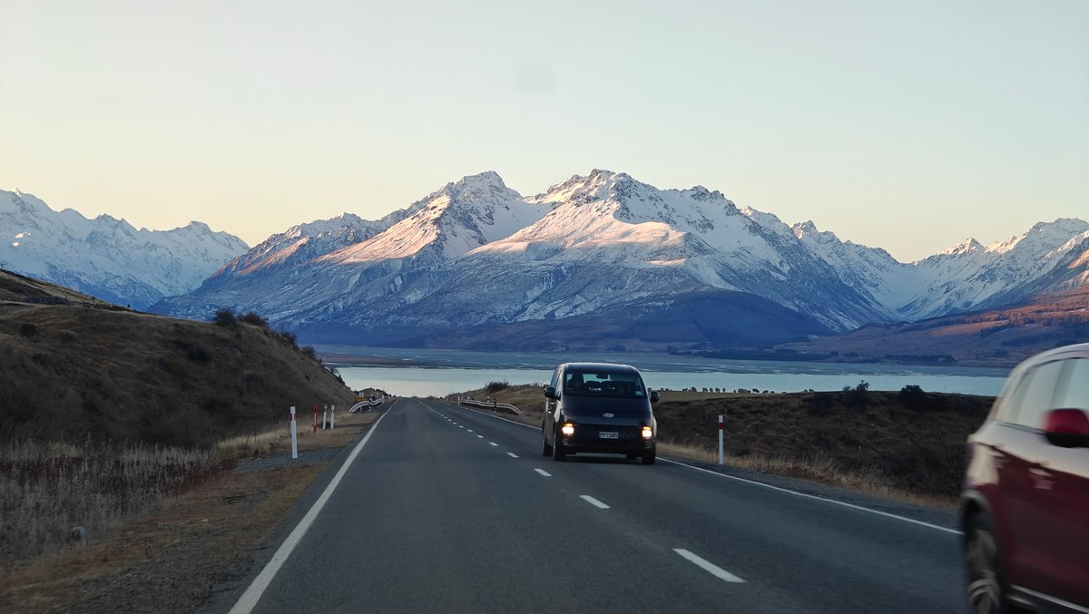 Highway with a campervan ahead and an oncoming