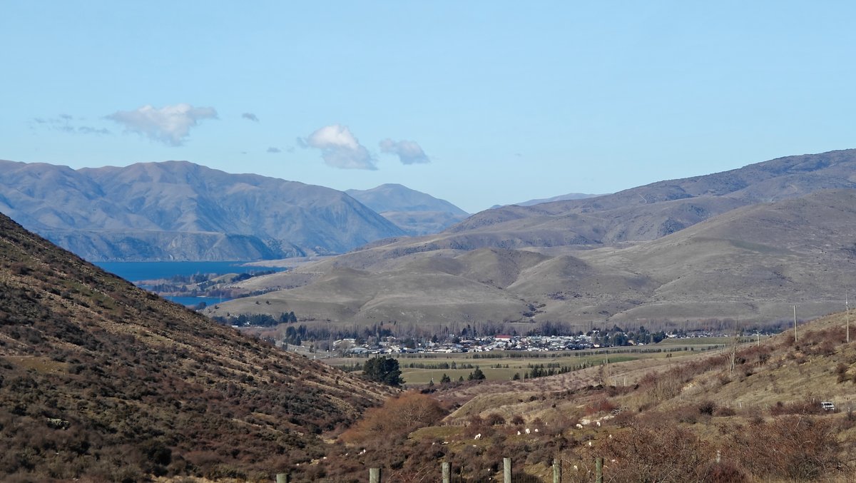 Horizontal view of the road dropping toward a