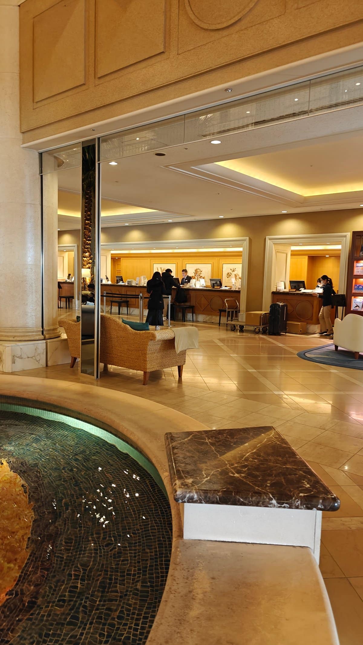 Hotel lobby with the reception/front desk beyond a