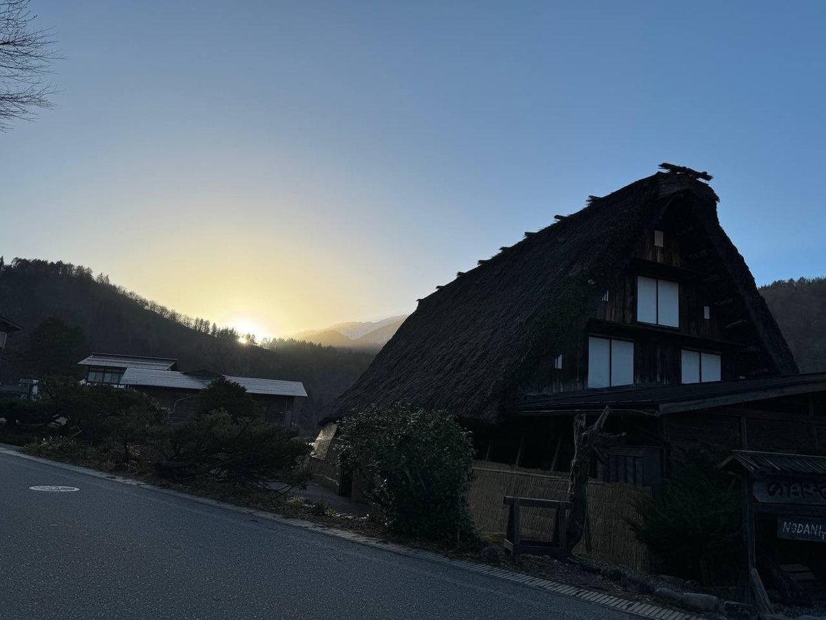 House silhouette against sunset