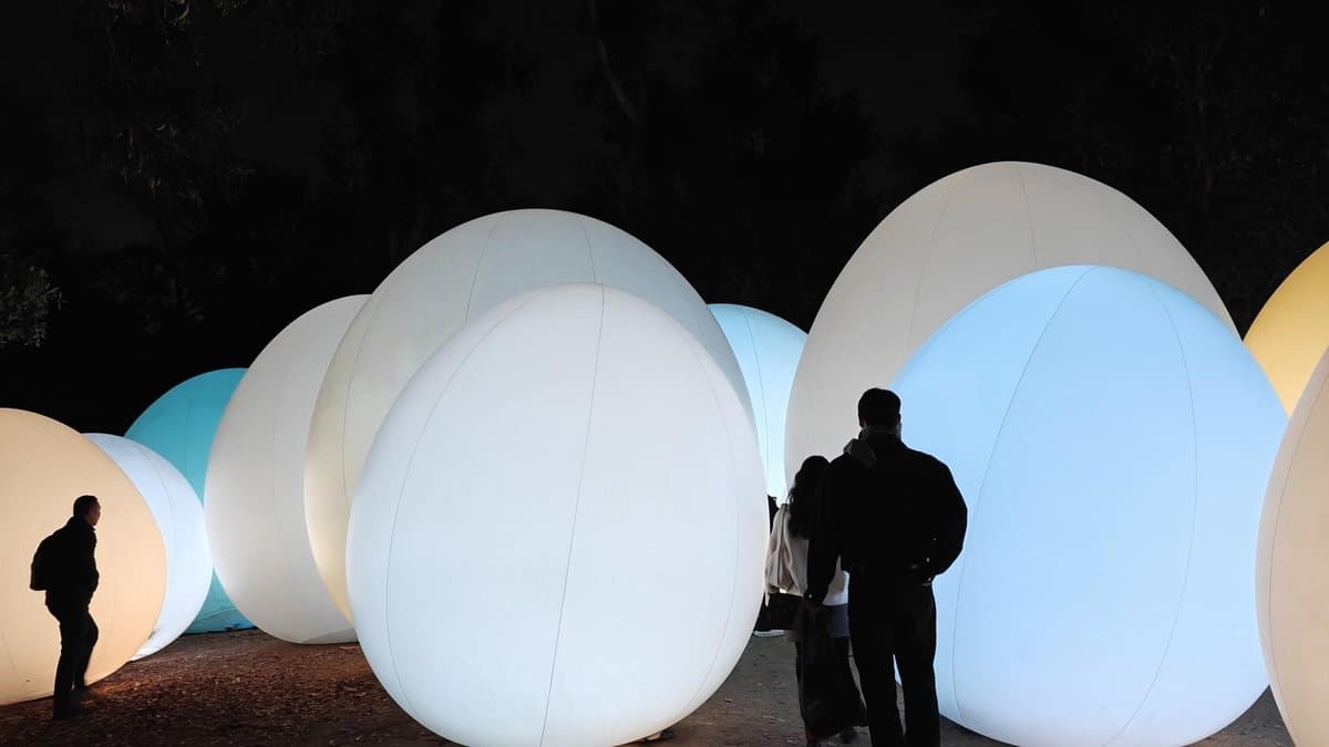 Illuminated giant egg sculptures at night