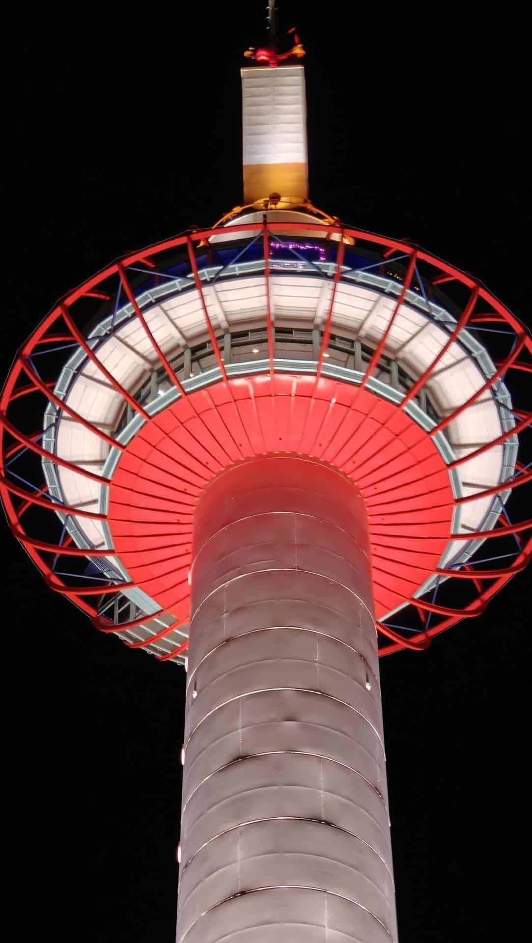 Illuminated tower against night sky