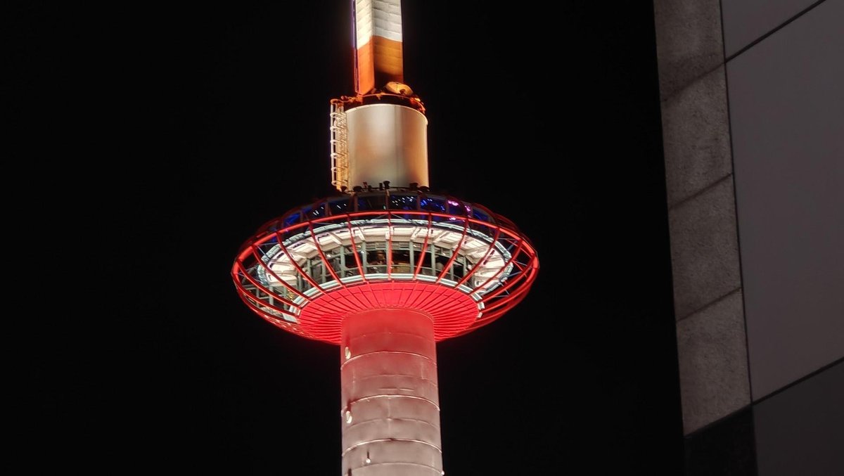 Illuminated tower with red lights