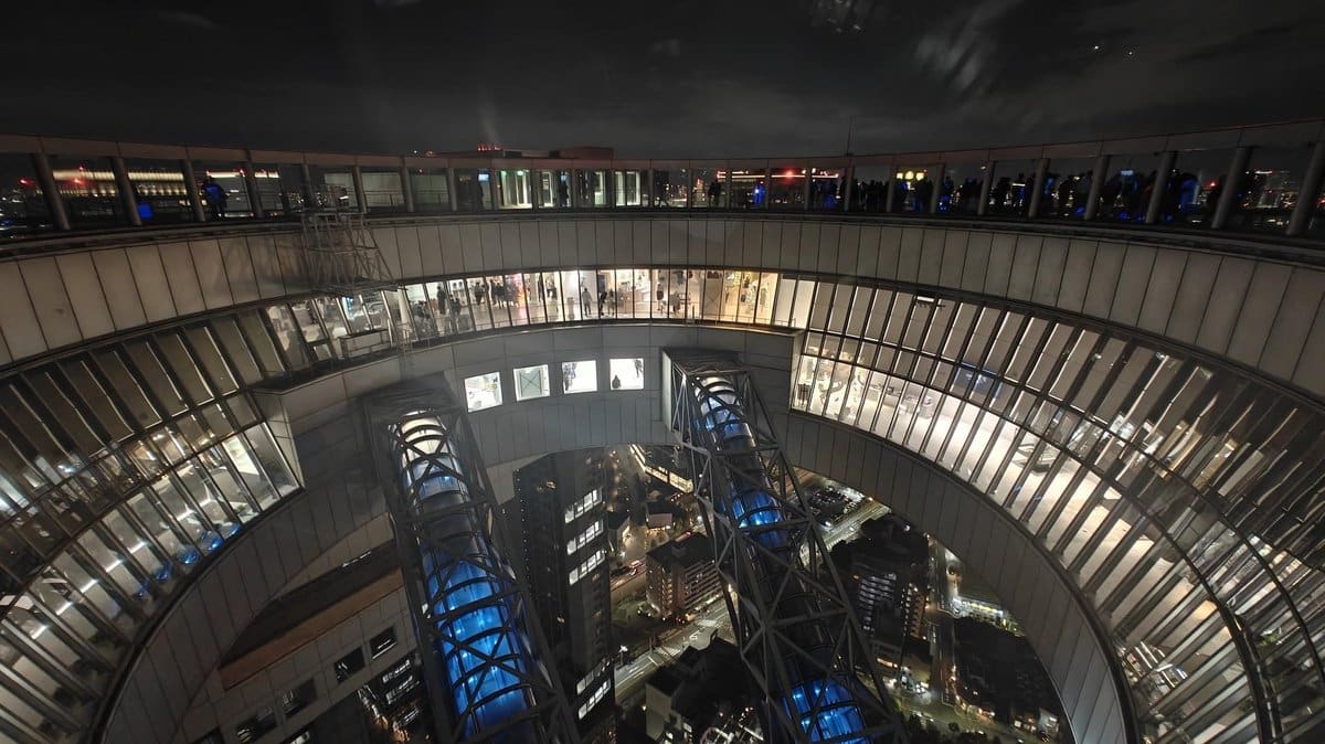 Illuminated urban observation deck at night