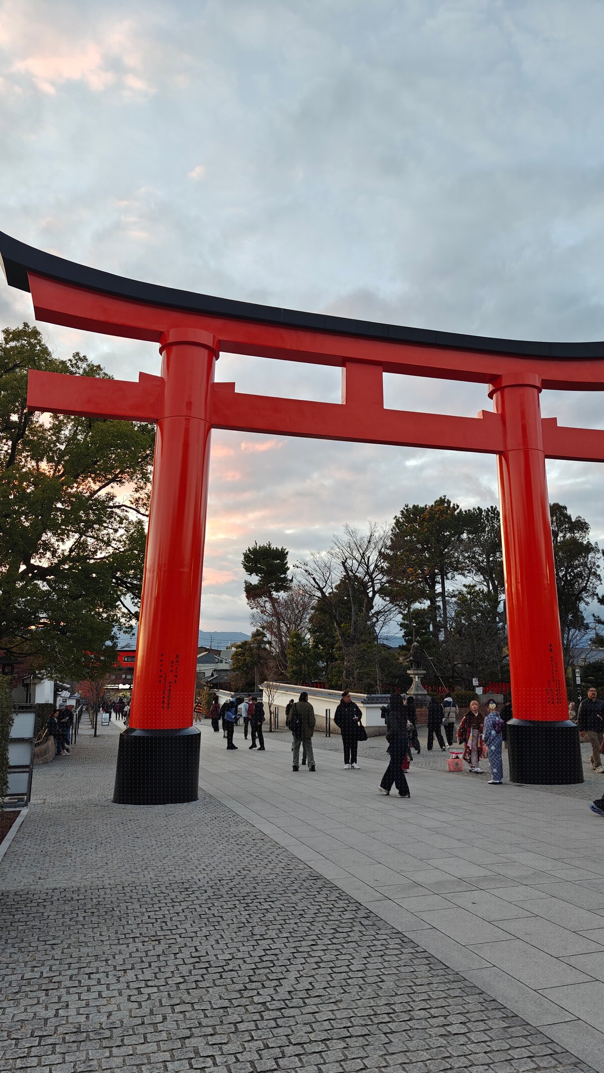 Large entrance torii and plaza in the early