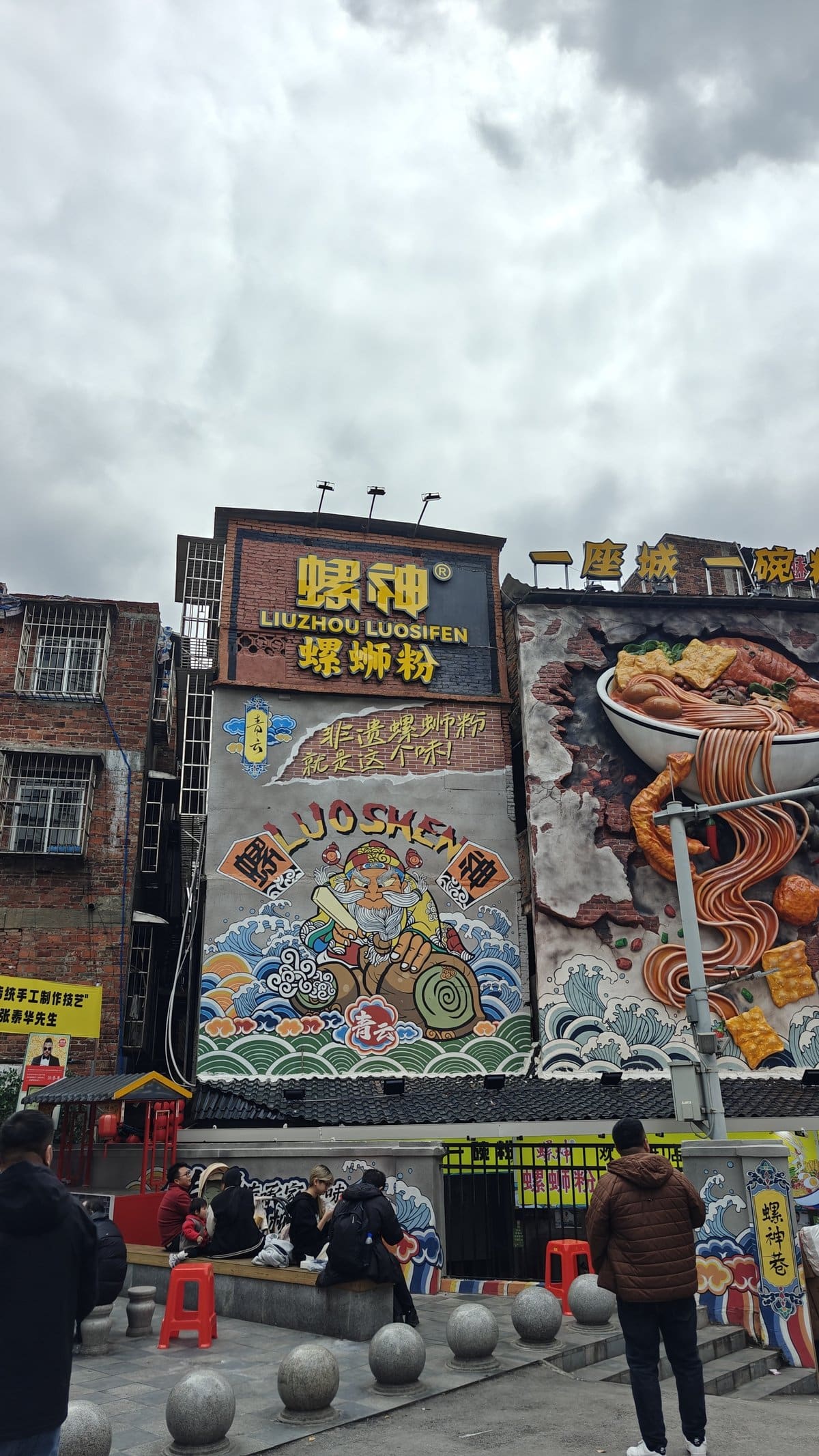 LuoSiFen shop sign and statues