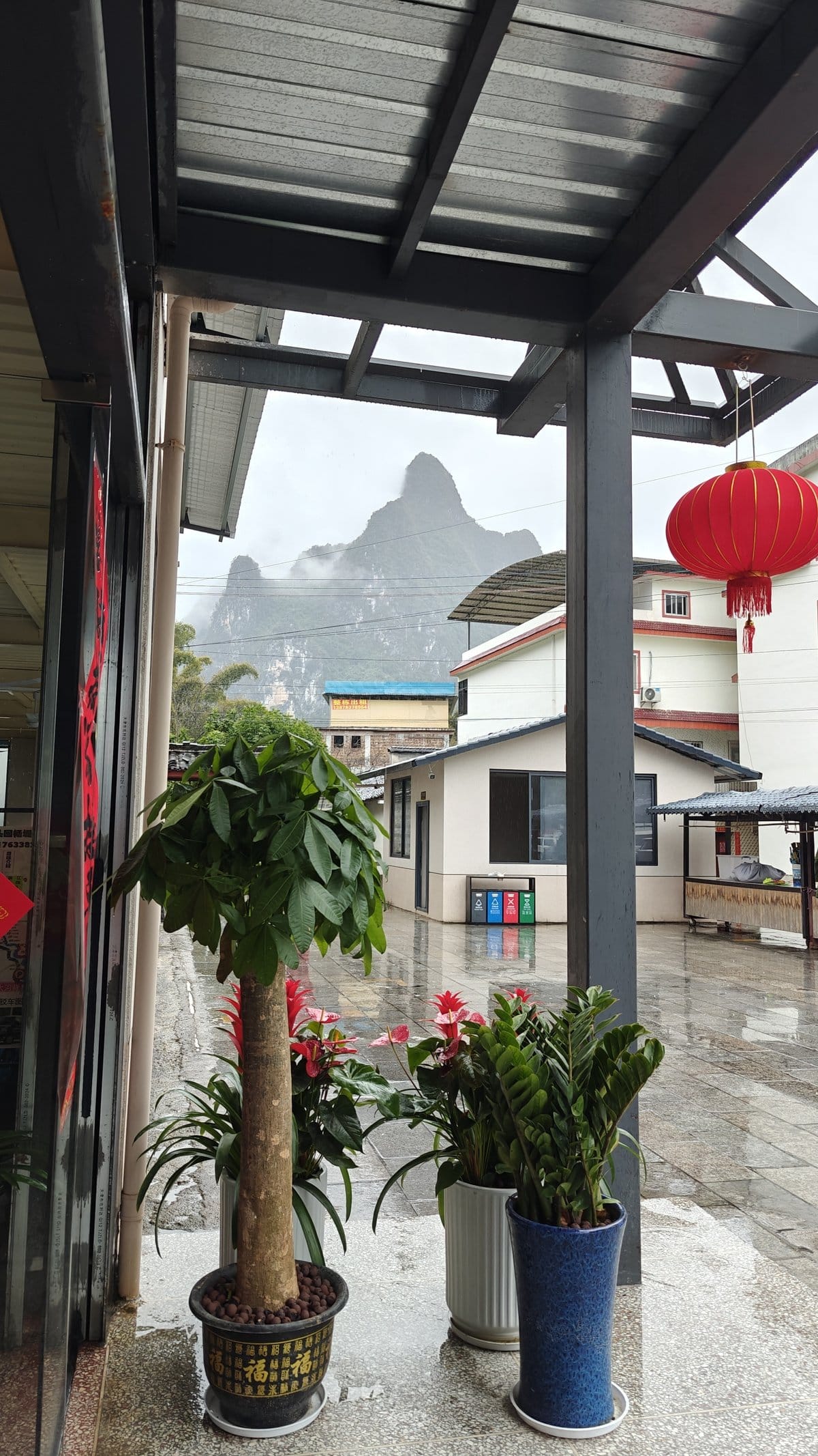 Misty karst peaks from dock entrance