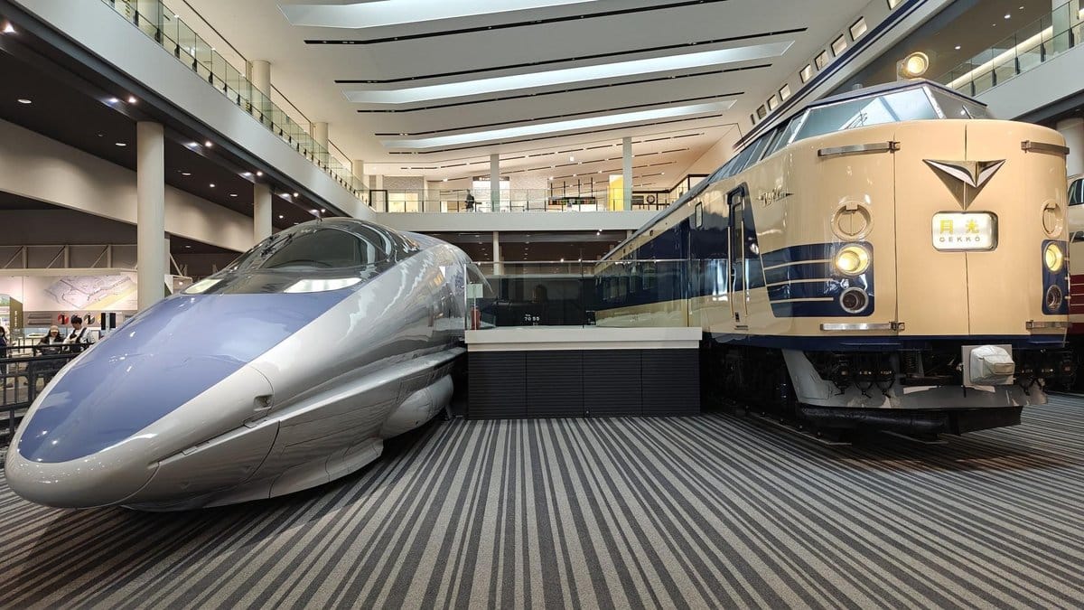 Modern and vintage trains display indoors