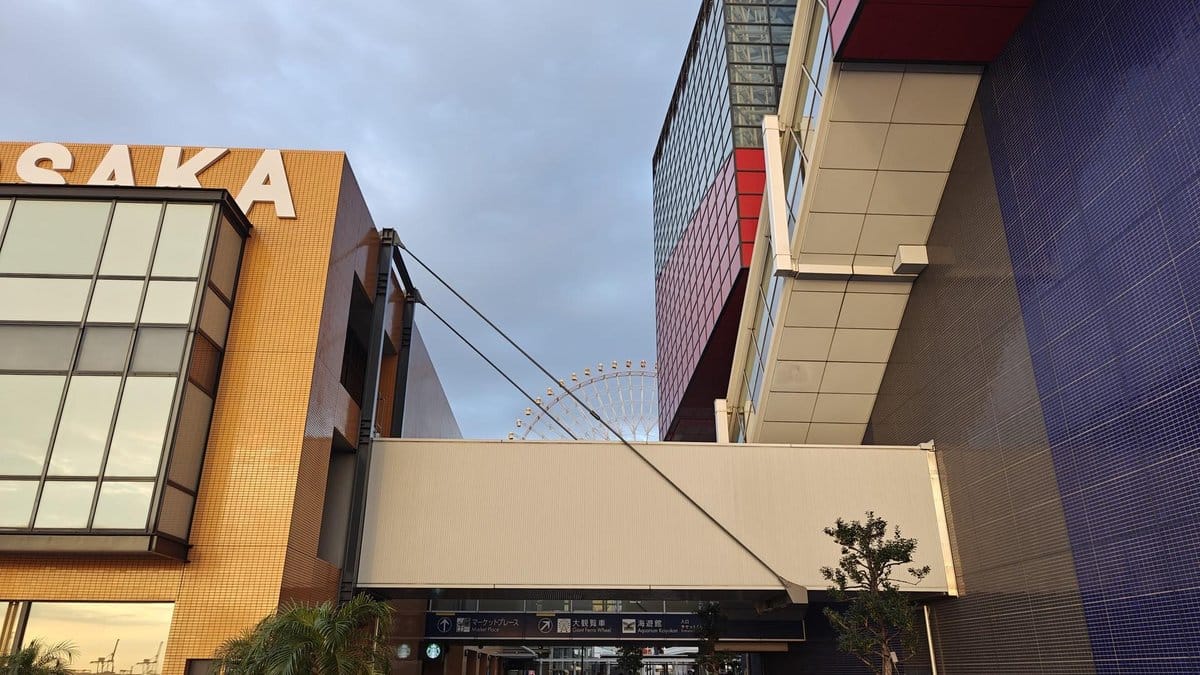 Modern building with ferris wheel