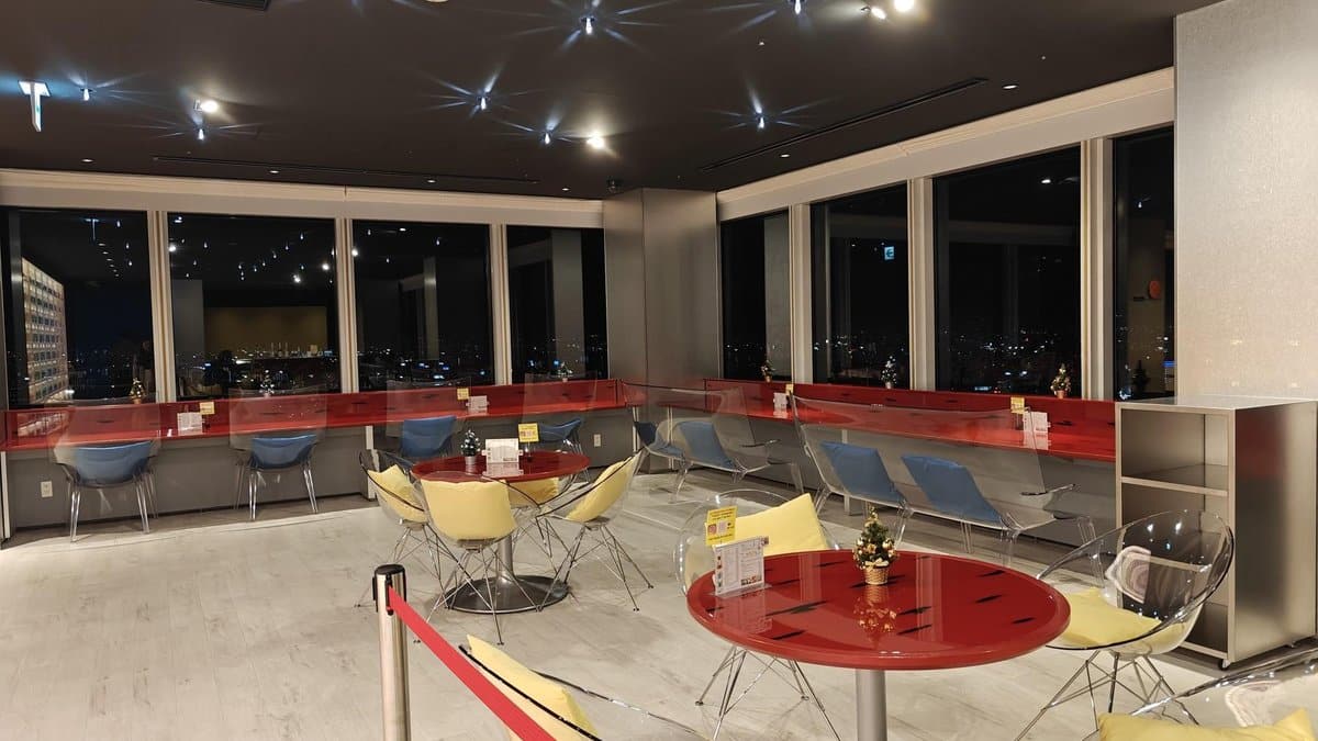 Modern cafe with city view at night