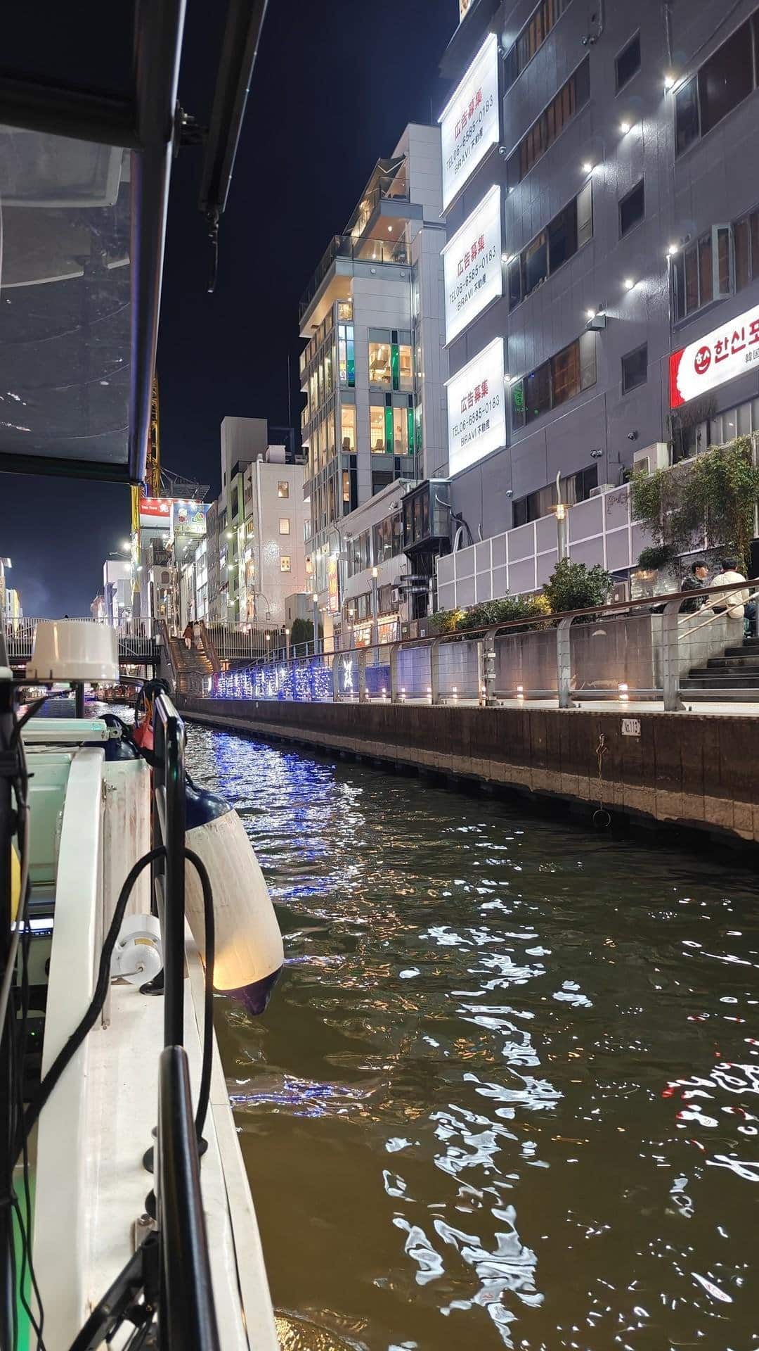 Night canal with city lights reflection