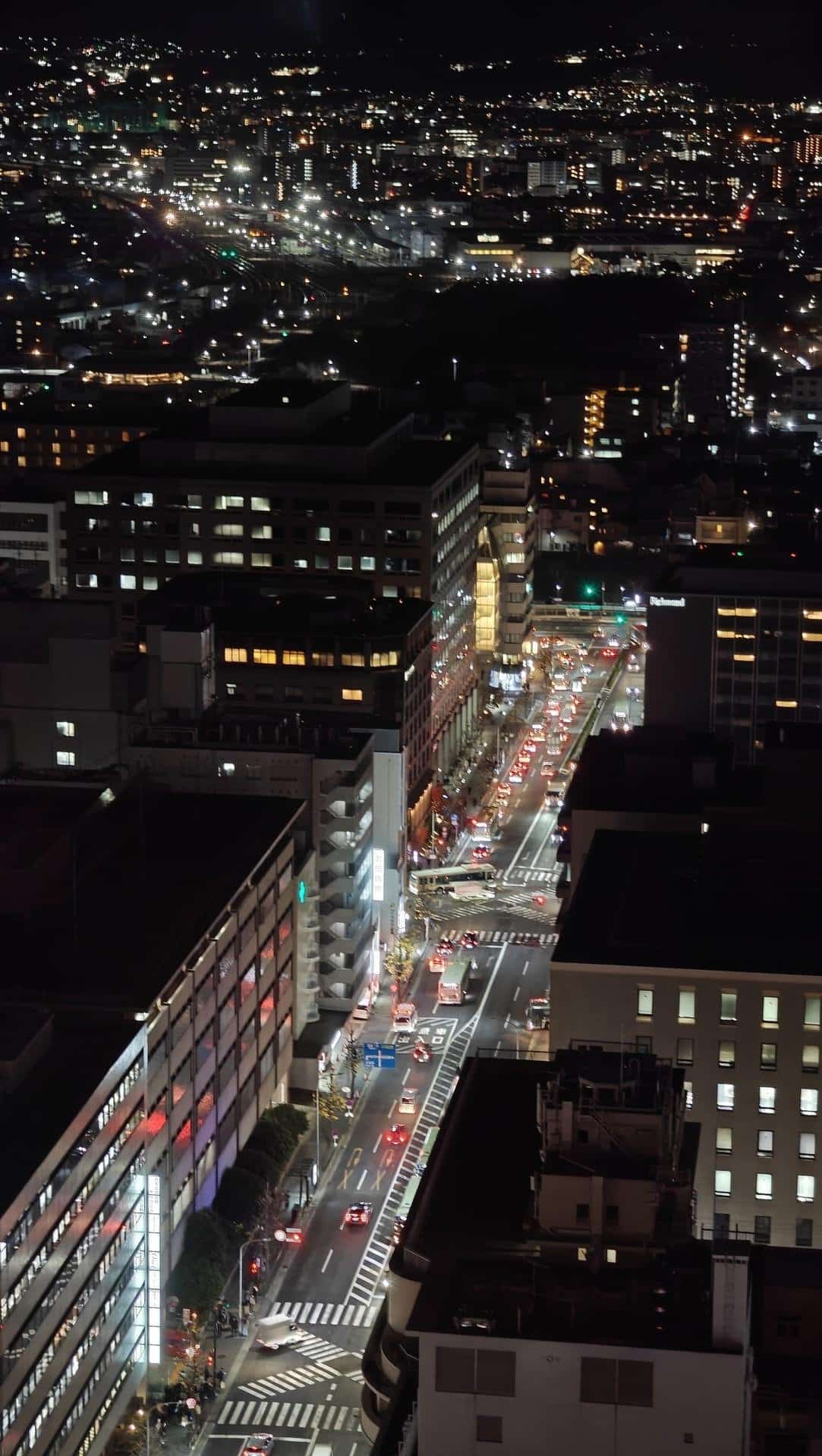 Night cityscape with bright streetlights