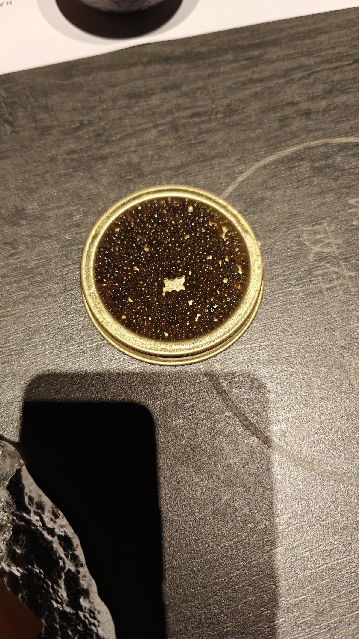 Open tin of sturgeon caviar