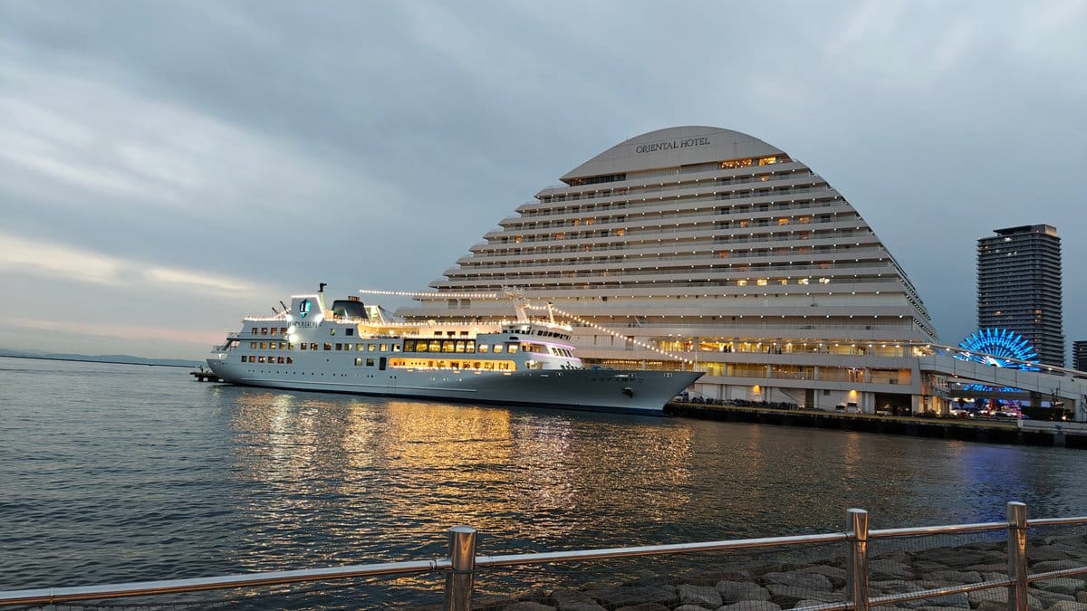 Oriental Hotel and a moored cruise ship at
