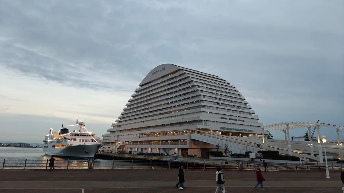 Oriental Hotel with a moored cruise ship and