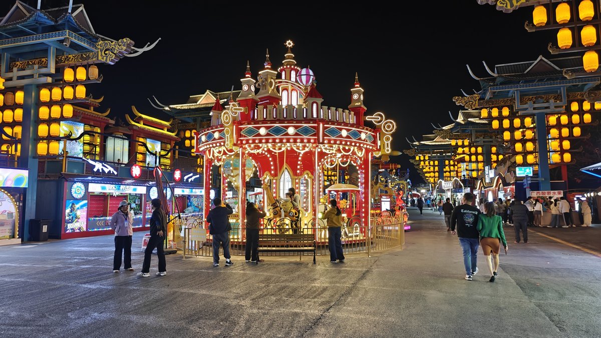 Ornate lit carousel merry-go-round