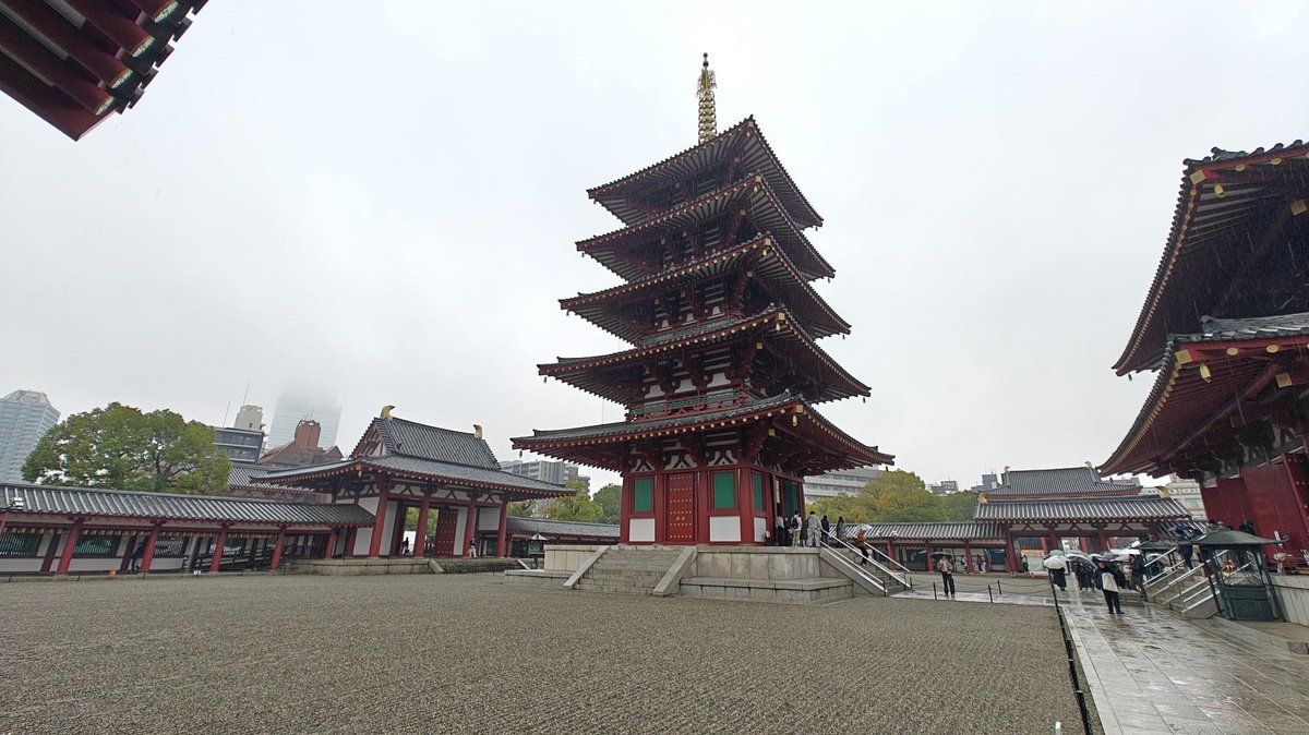 Pagoda in temple courtyard on cloudy day