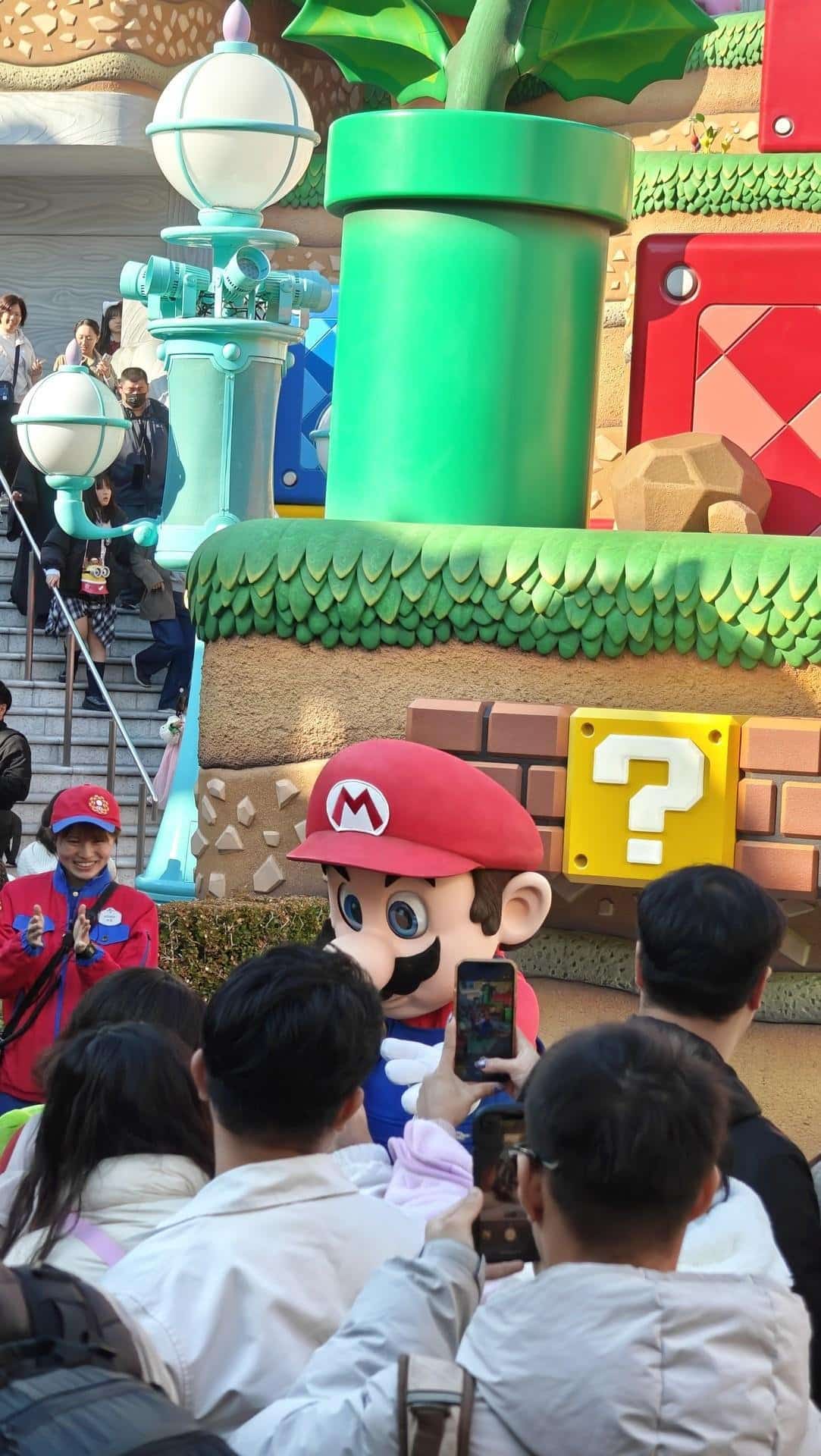 People enjoying Mario-themed attraction