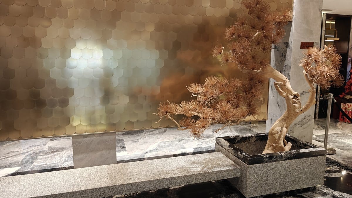 Reception desk golden wall art
