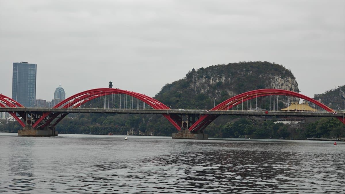 Red arch bridge karst mountain