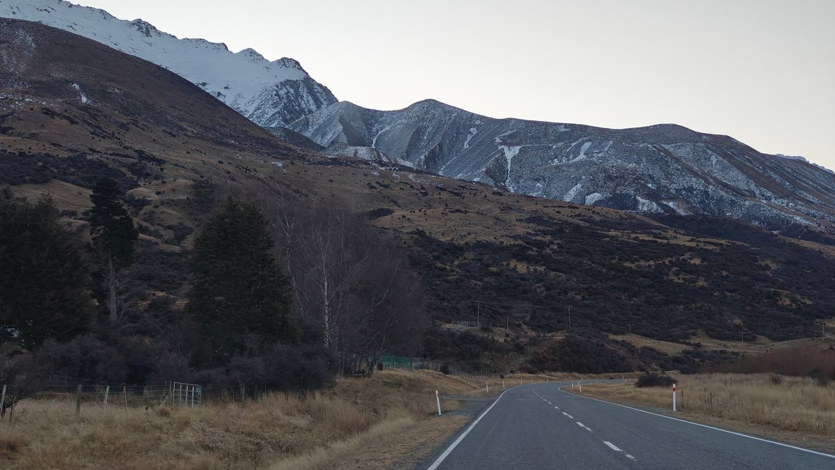 Road running along the base of dry brown